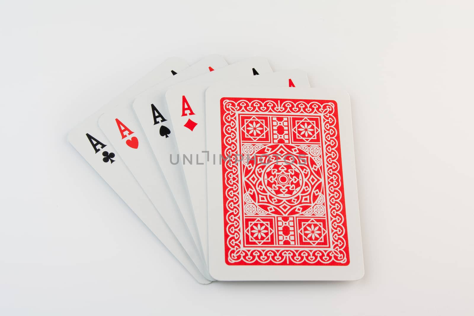 close up of  four aces on white background