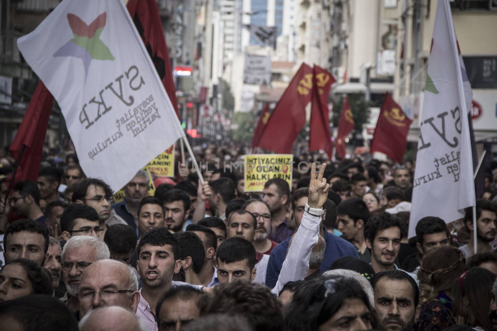 TURKEY, Izmir: Labor organizations and civil society organizations gathered in Izmir, Turkey on October 10, 2015 after explosions killed nearly 100 people in Ankara earlier in the day.Two bombs went off near the main train station in the city. According to officials the bombs went off at a peace rally killing 97 and injuring 400 more.These images show people at the rally demanding justice. Several people at the rally were taken into custody after clashing with police.