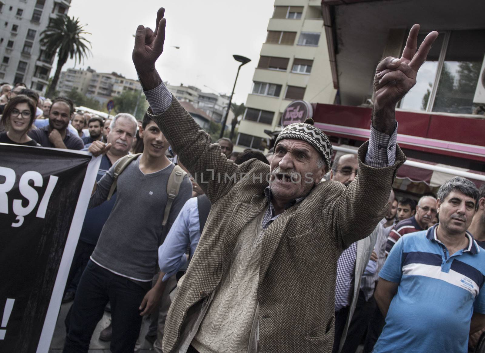 TURKEY, Izmir: Labor organizations and civil society organizations gathered in Izmir, Turkey on October 10, 2015 after explosions killed nearly 100 people in Ankara earlier in the day.Two bombs went off near the main train station in the city. According to officials the bombs went off at a peace rally killing 97 and injuring 400 more.These images show people at the rally demanding justice. Several people at the rally were taken into custody after clashing with police. 