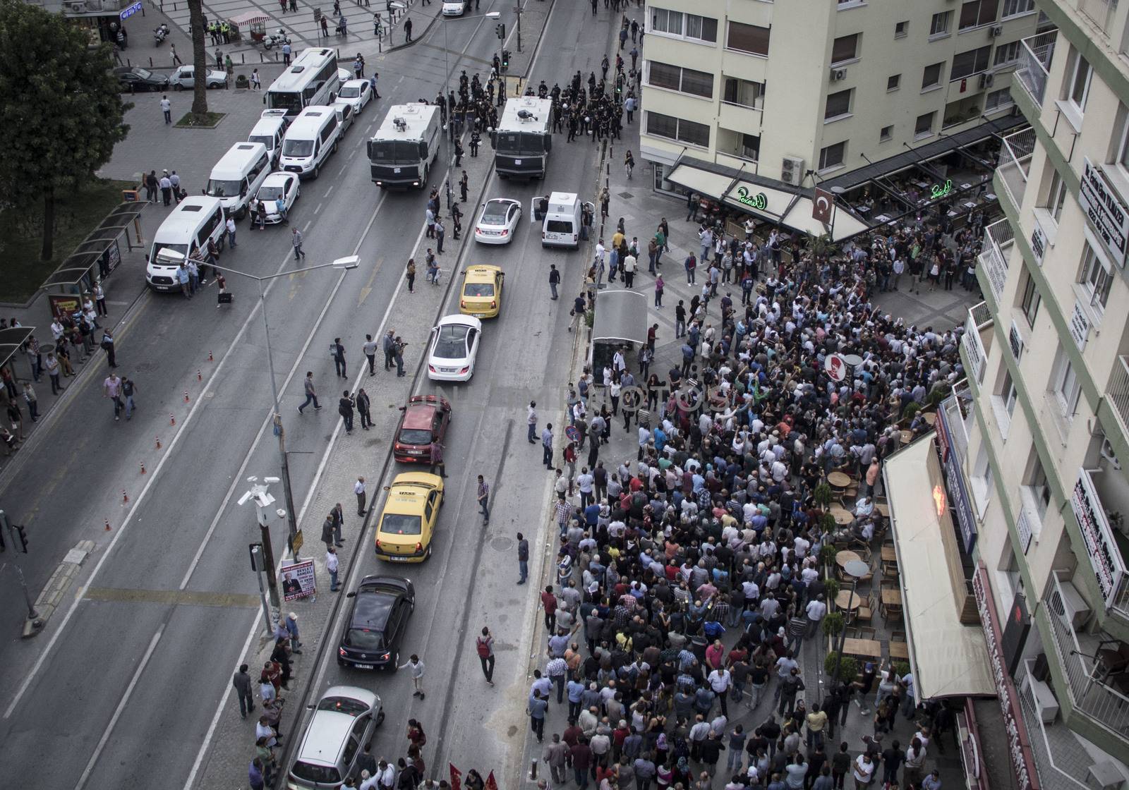 TURKEY, Izmir: Labor organizations and civil society organizations gathered in Izmir, Turkey on October 10, 2015 after explosions killed nearly 100 people in Ankara earlier in the day.Two bombs went off near the main train station in the city. According to officials the bombs went off at a peace rally killing 97 and injuring 400 more.These images show people at the rally demanding justice. Several people at the rally were taken into custody after clashing with police.