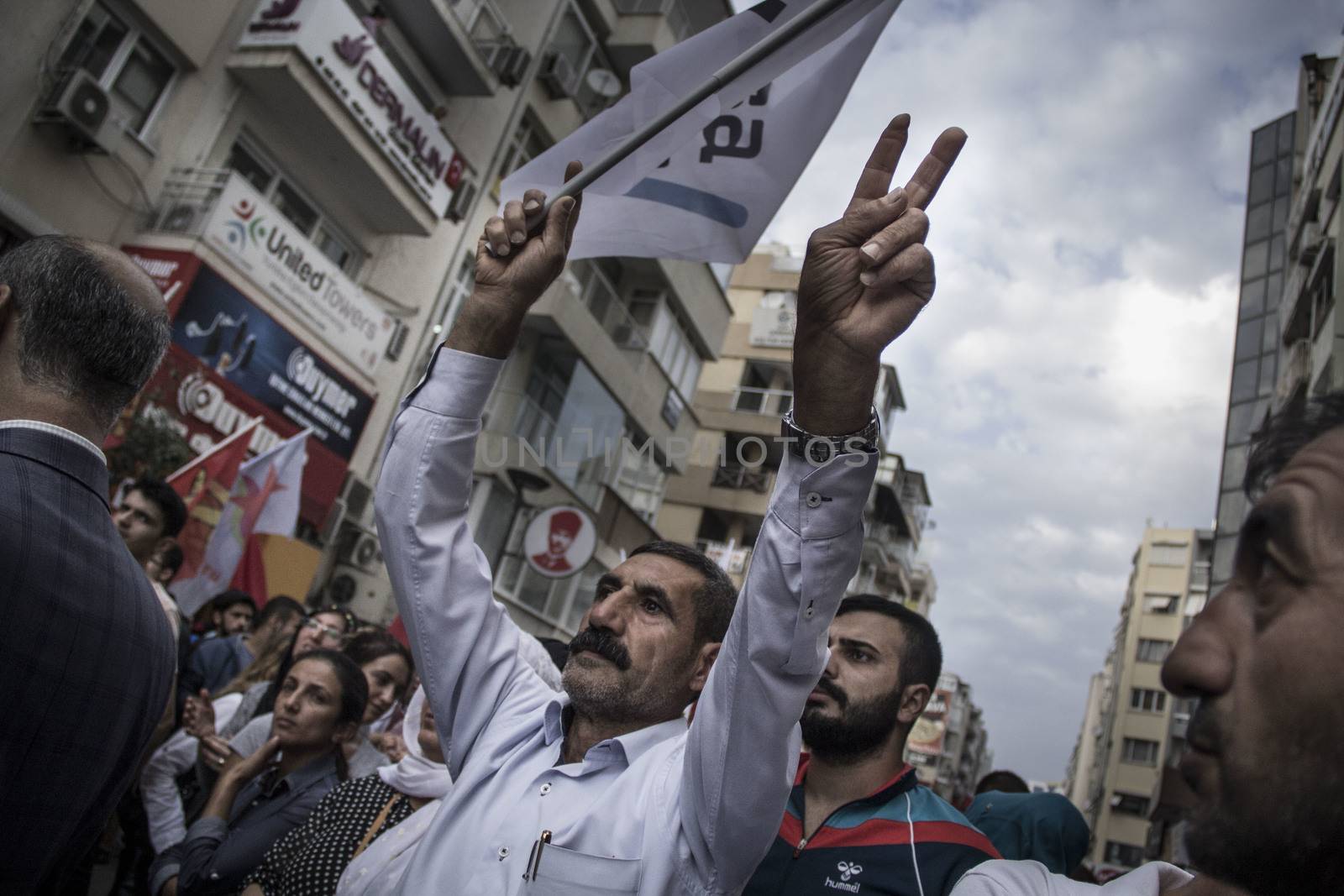 TURKEY, Izmir: Labor organizations and civil society organizations gathered in Izmir, Turkey on October 10, 2015 after explosions killed nearly 100 people in Ankara earlier in the day.Two bombs went off near the main train station in the city. According to officials the bombs went off at a peace rally killing 97 and injuring 400 more.These images show people at the rally demanding justice. Several people at the rally were taken into custody after clashing with police. 