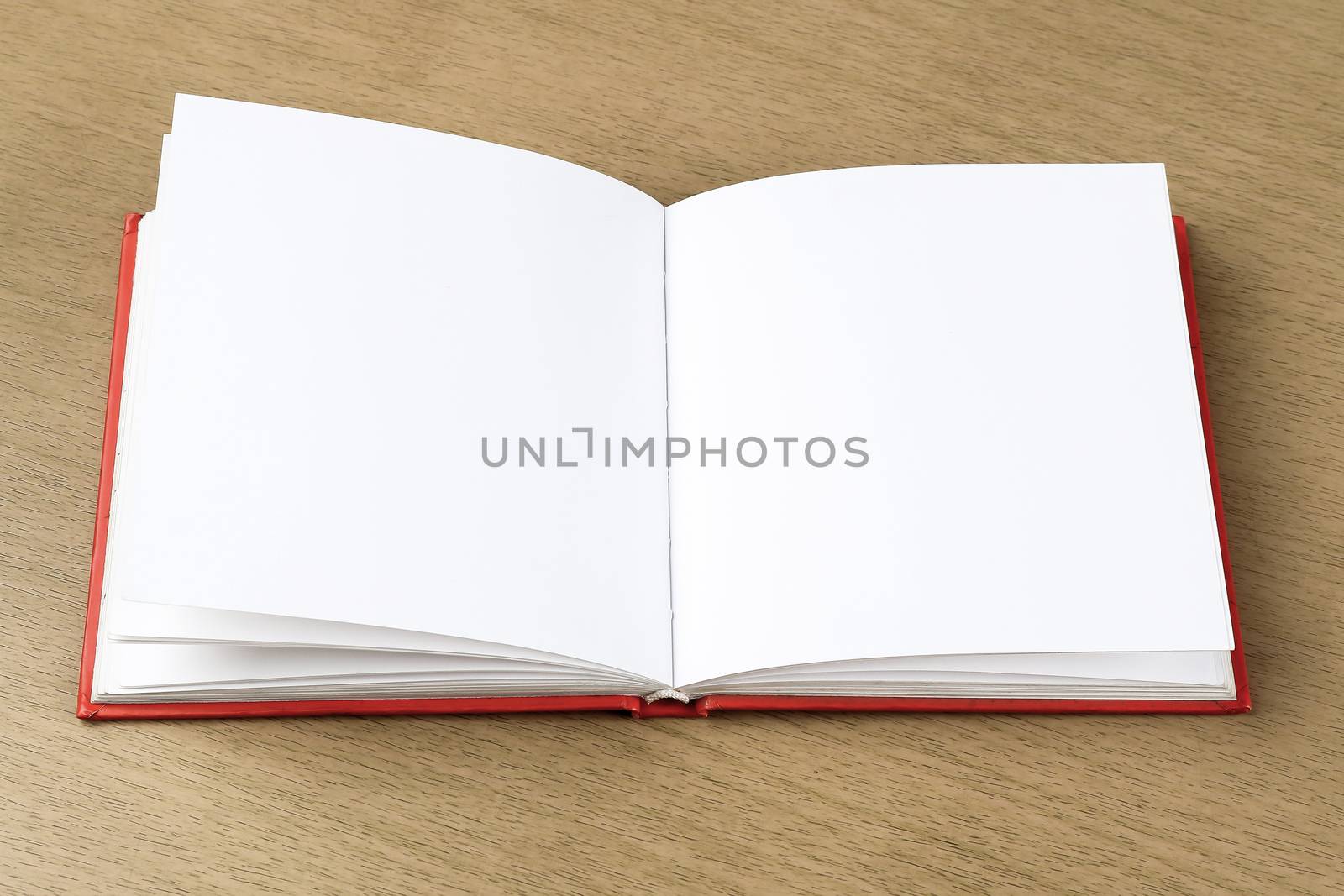 empty pages of opened notebook or sketchbook  on wooden table, business, education, art