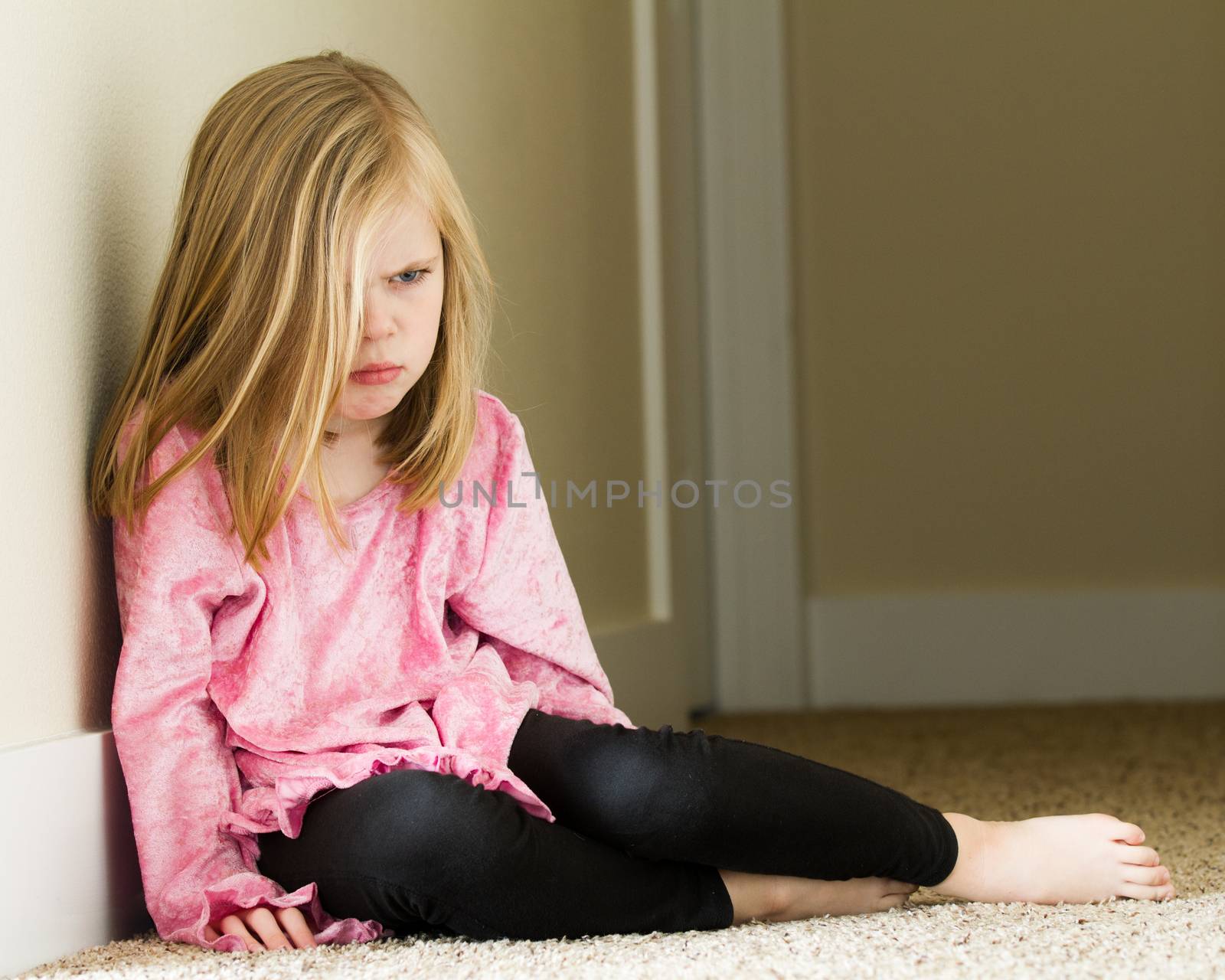 Girl sitting down upset and having a bad day