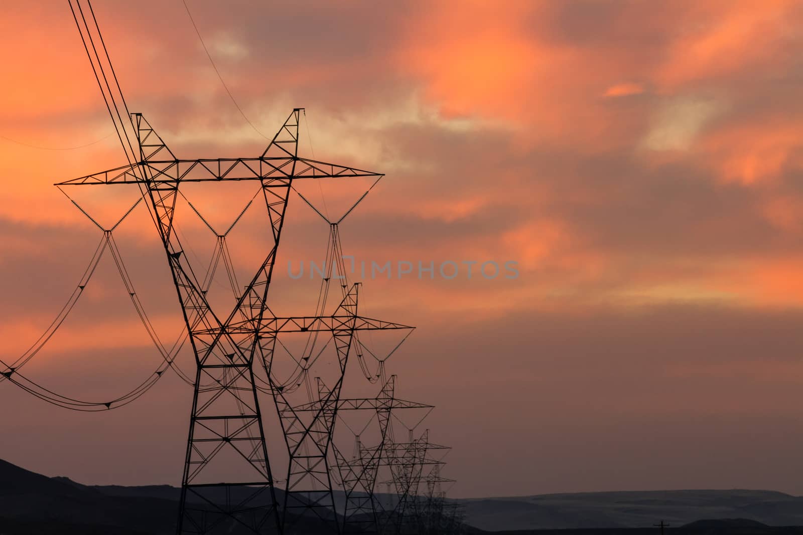 Power transmission lines against the sky