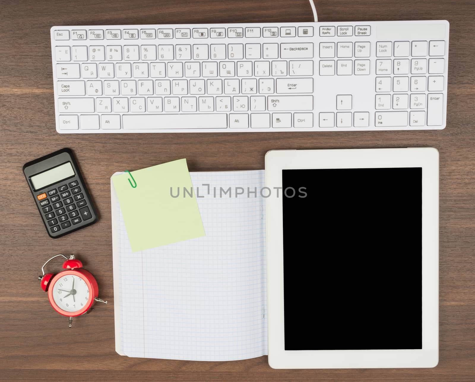 Tablet with office supplies by cherezoff
