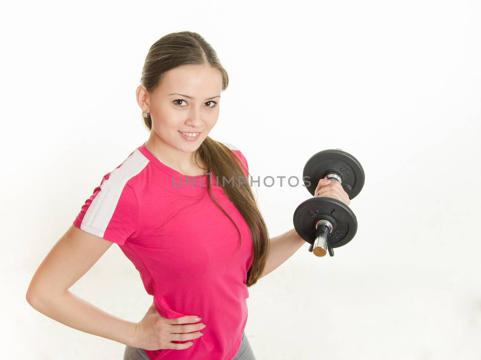 Young beautiful girl athlete Europeans conducting physical training