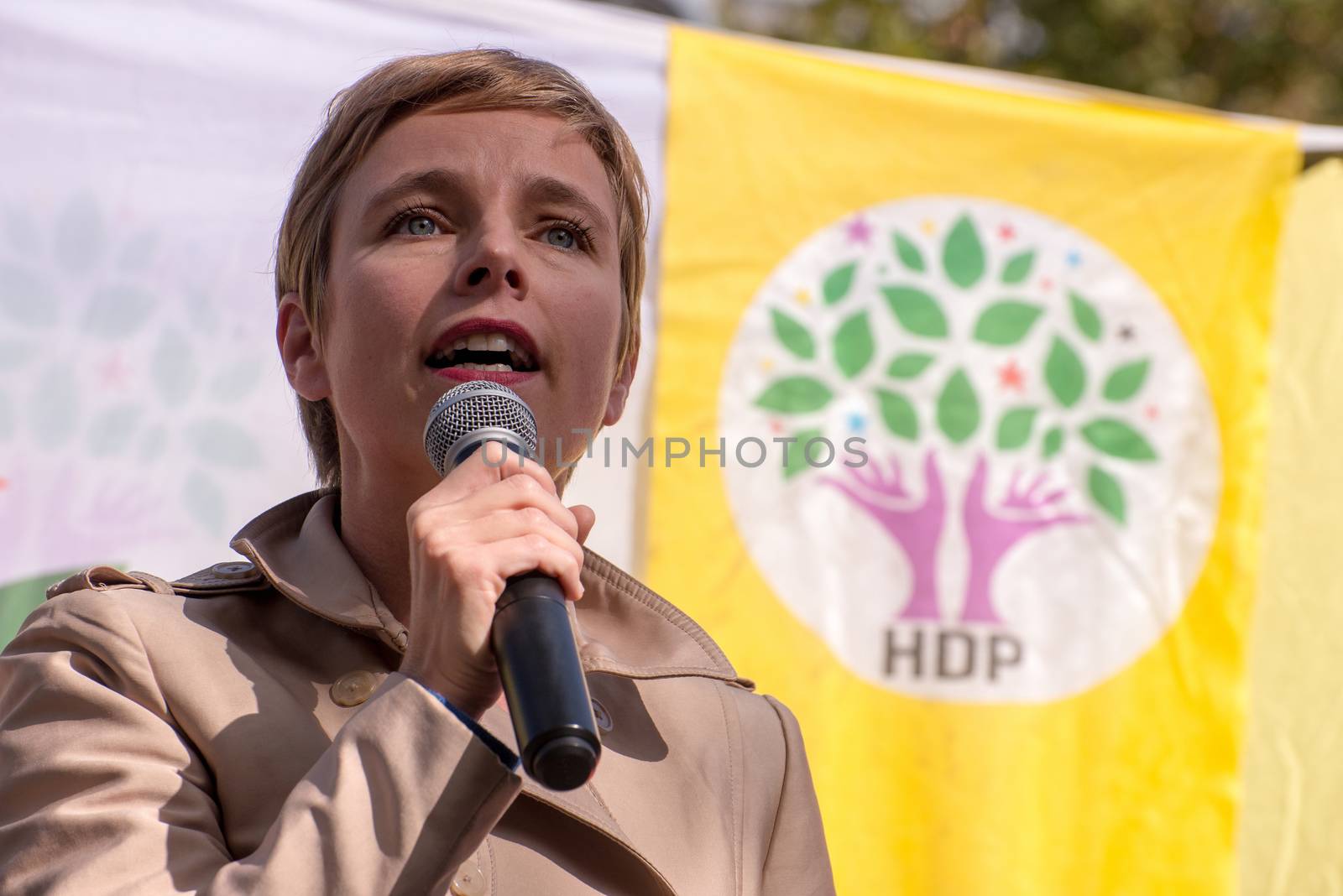 FRANCE, Paris:  Spokesperson of one of radical left-handed party Front de Gauche forces Cl�mentine Autain makes a speech while protesters gather in Place de la R�publique in Paris on October 10, 2015, in tribute to the victims of the terror attack in Ankara. The same day, at least 95 people died after a twin explosion in the center of the capital city in Turkey. 