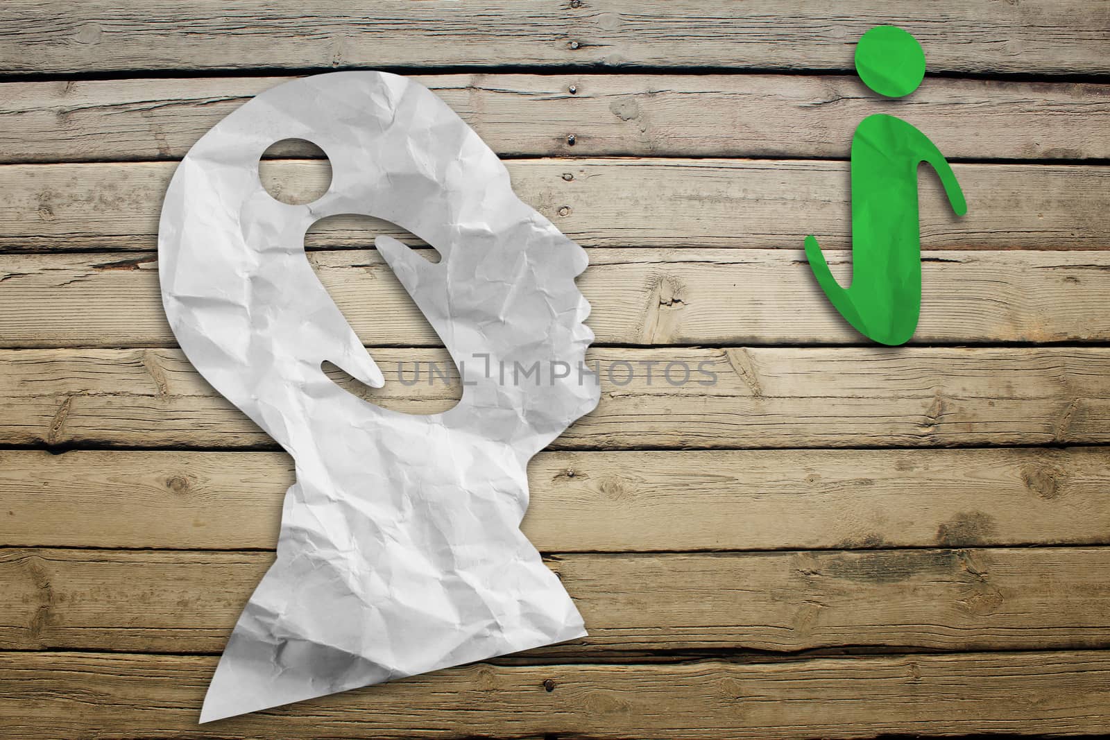 Paper humans head with internet symbol on wood deck background