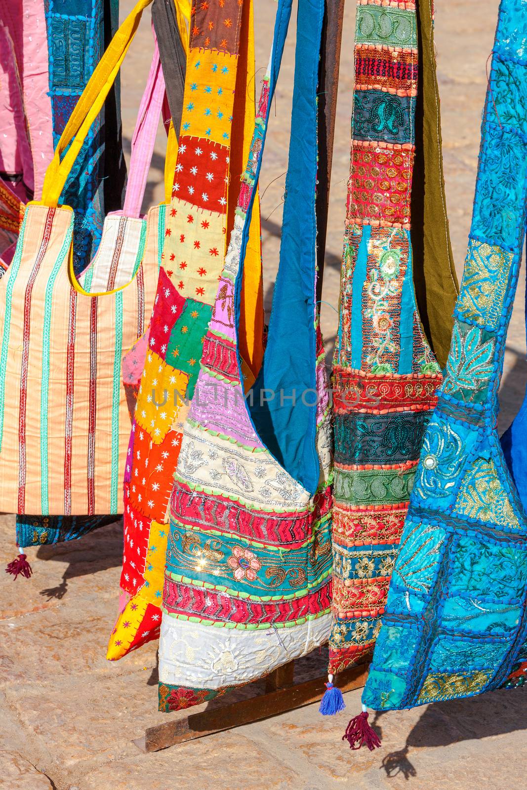 Decorative patchwork bags on a street market in Rajasthan, India by vladimir_sklyarov