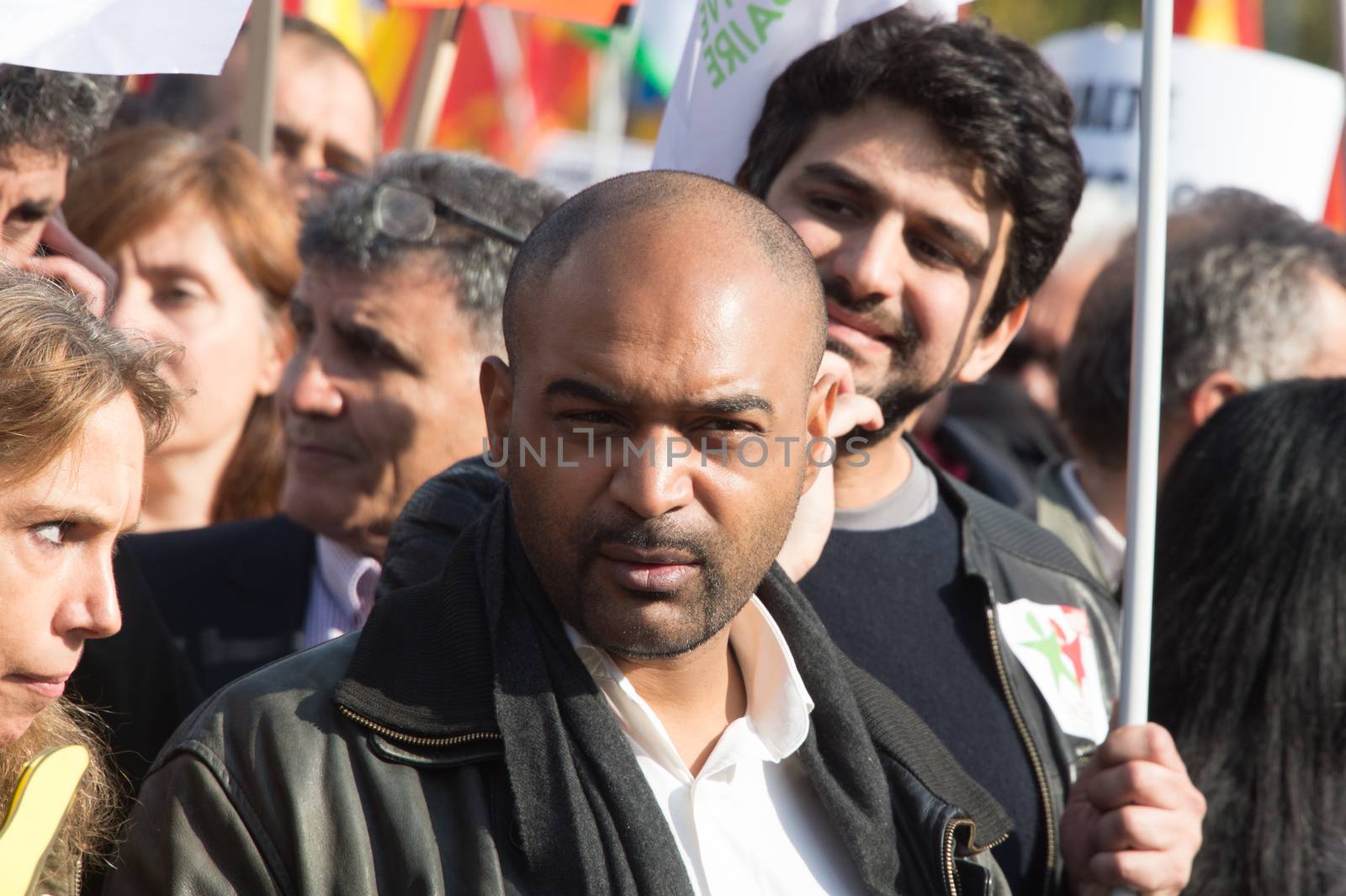 FRANCE, Paris : SOS Racism head Dominique Sopo stands while protesters gather in Place de la R�publique in Paris on October 11, 2015, for the second time after the terror attack in Ankara, in tribute to the victims of the twin explosion in Turkish capital city. On October 11, 2015, at least 95 people died after a twin explosion in the center of the capital city in Turkey. The Turkish government declared three days of mourning and said that it won't delay legislative elections expected for November 1st, 2015. 