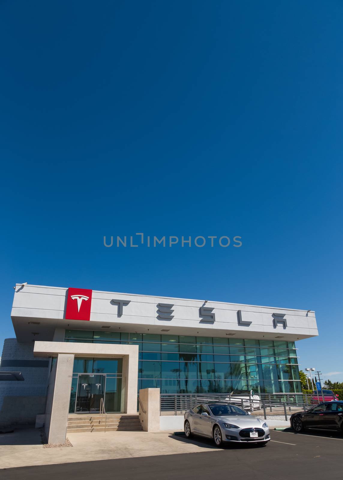 BUENA PARK, CA/USA - OCTOBER 10, 2015: Tesla Motors automobile dealership. Tesla Motors, Inc. is an American automotive and energy storage company.