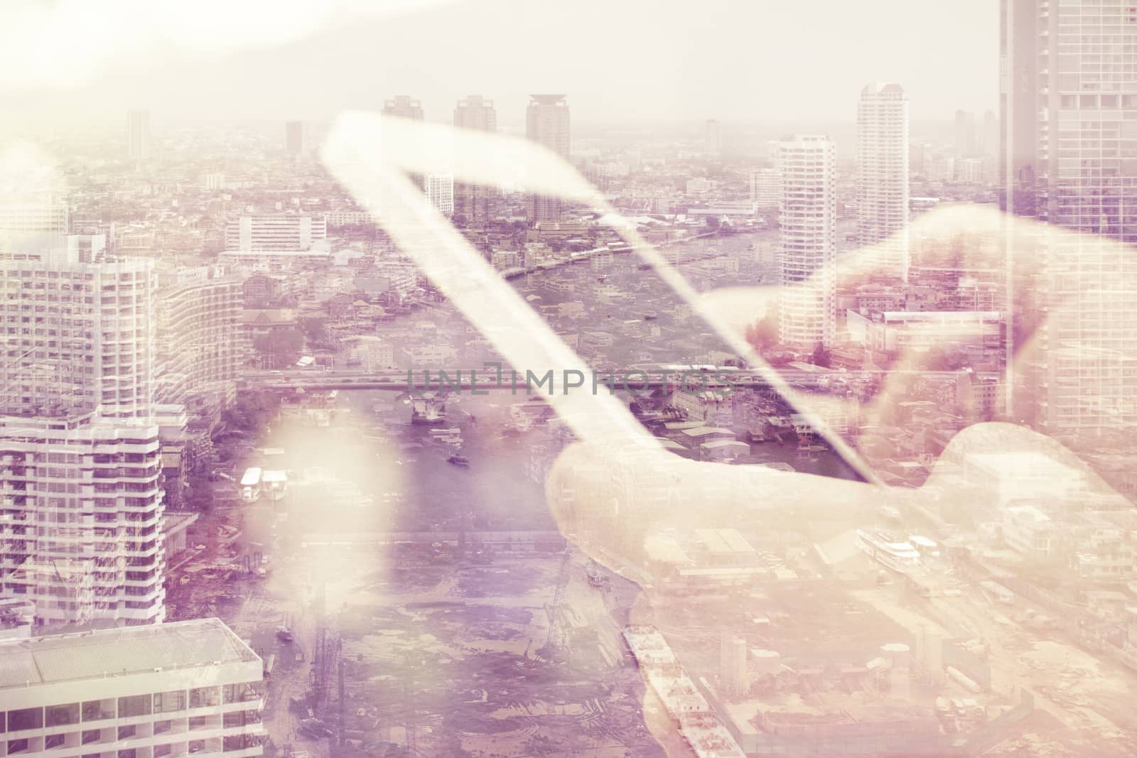 Double exposure image of people with smart phone and cityscape background,Business technology concept.