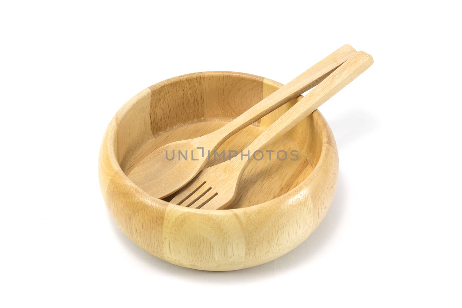 Wooden bowl with white background.