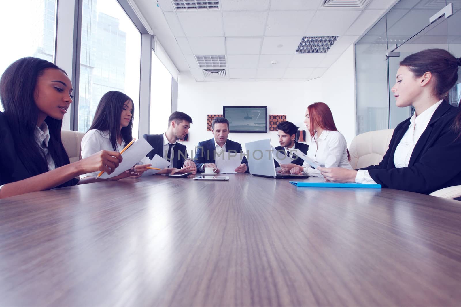 Business meeting of diverse people around the table