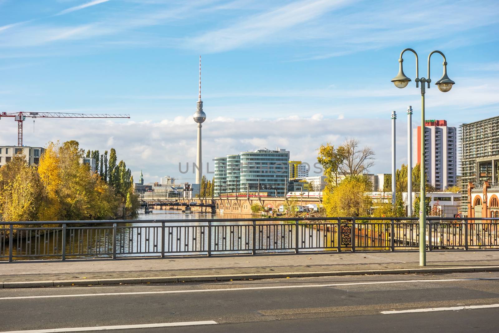 Berlin, Germany - October 26, 2013: Berlin skyline with TV Tower at day in autumn - view from bridge Schillingbruecke.