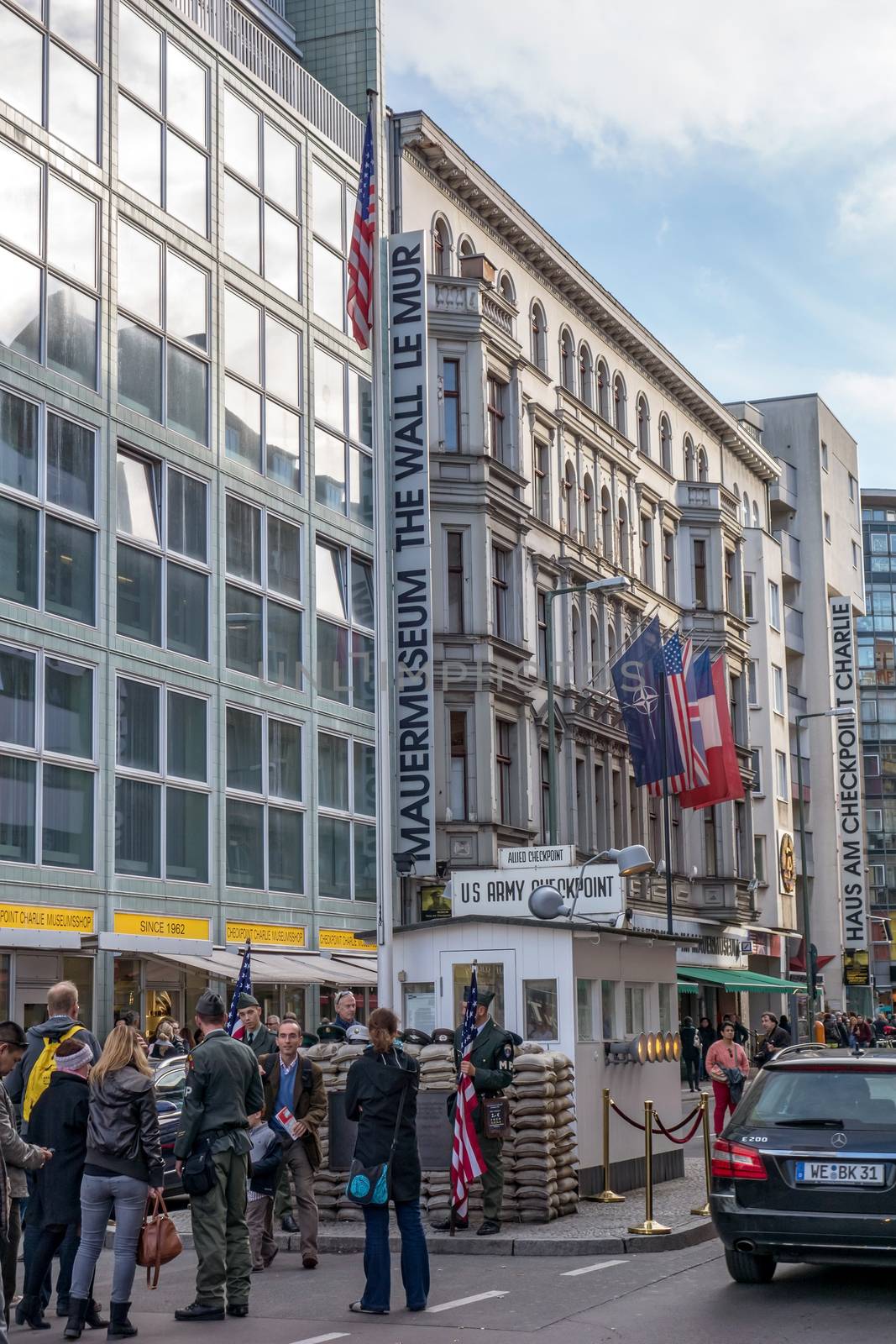 Berlin, Germany - October 26, 2013: Checkpoint Charlie streetview - it was the most famous crossing point between East and West Germany during the cold war.