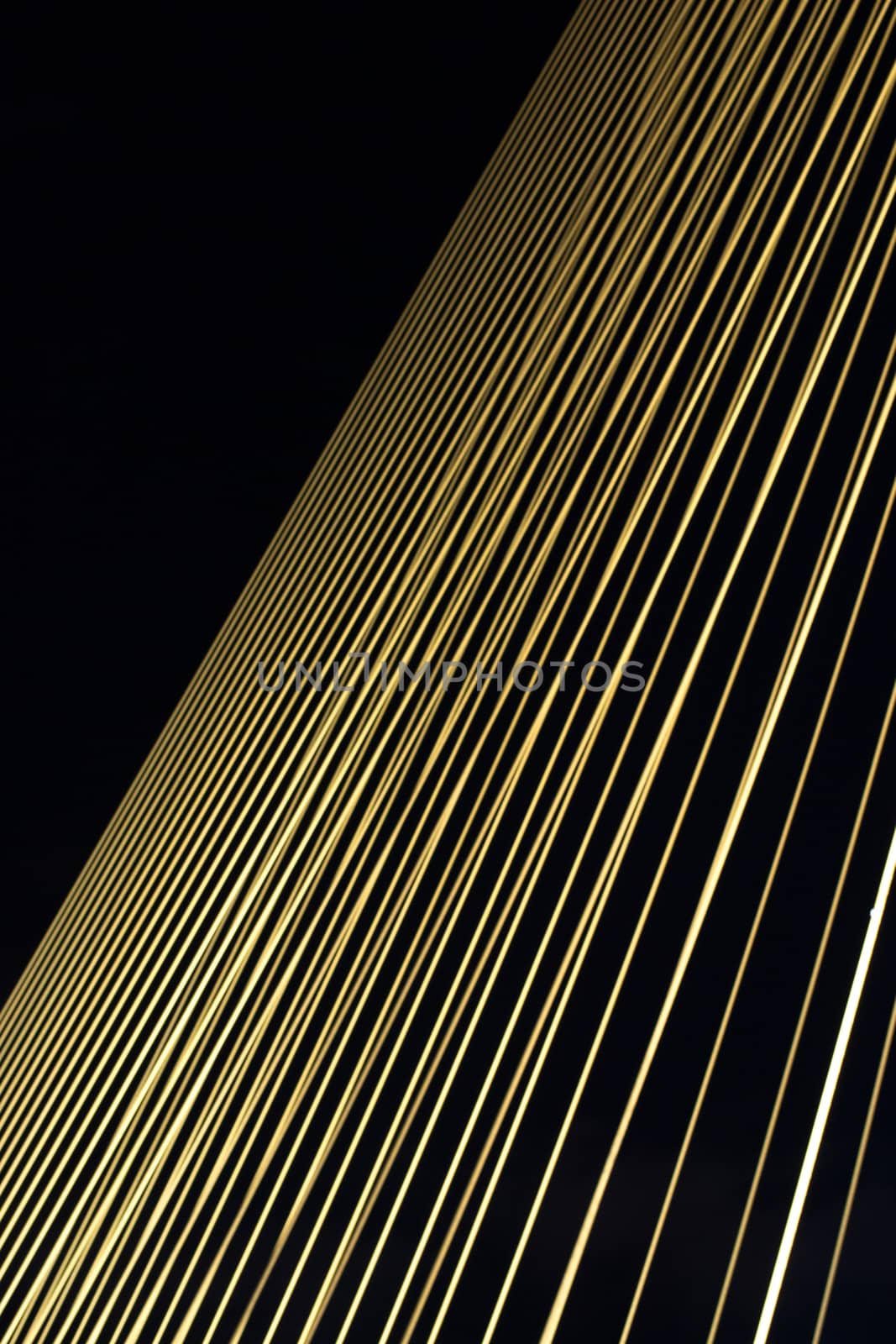 Steel line of Rama 8 Bridge at night.