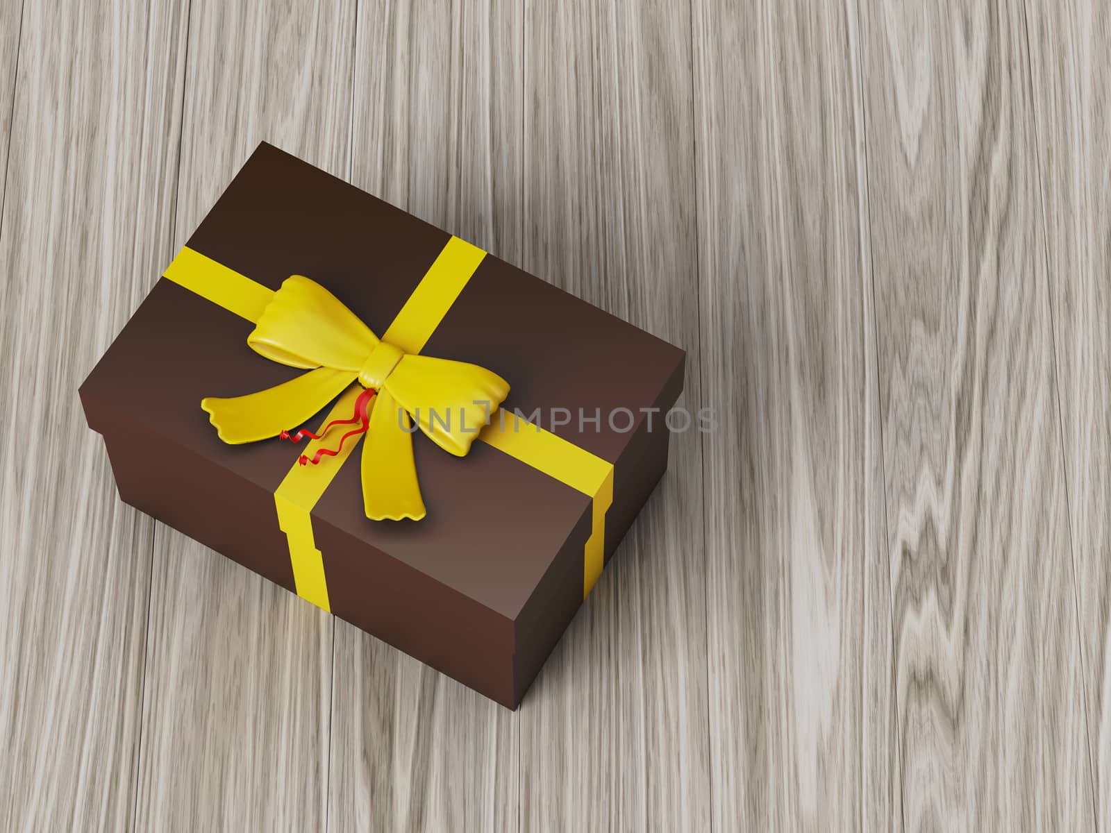 dark brown gift box with yellow ribbon bow by teerawit