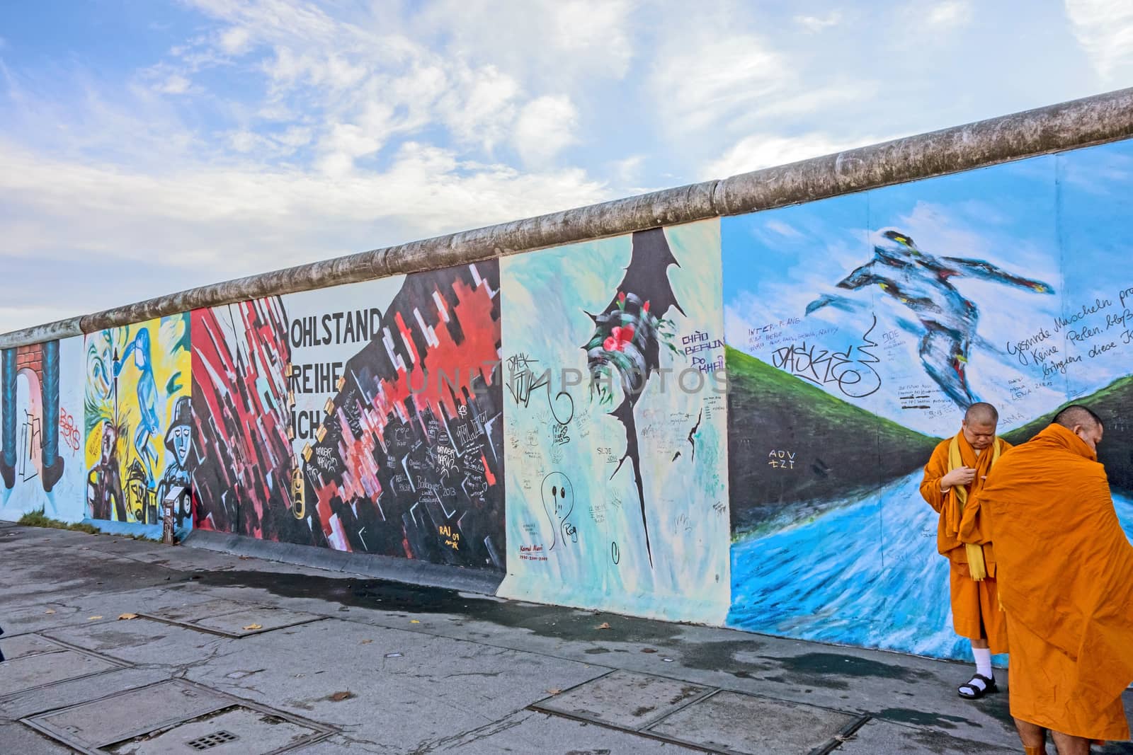 Berlin, Germany - October 26, 2013: East Side Gallery - an international memorial for freedom. Former Berlin Wall - a barrier within Germany, dividing the country.