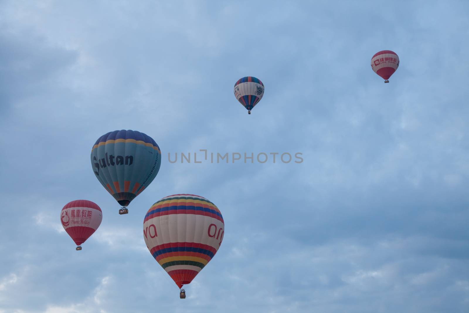 hot air balloons cruising in air by haiderazim