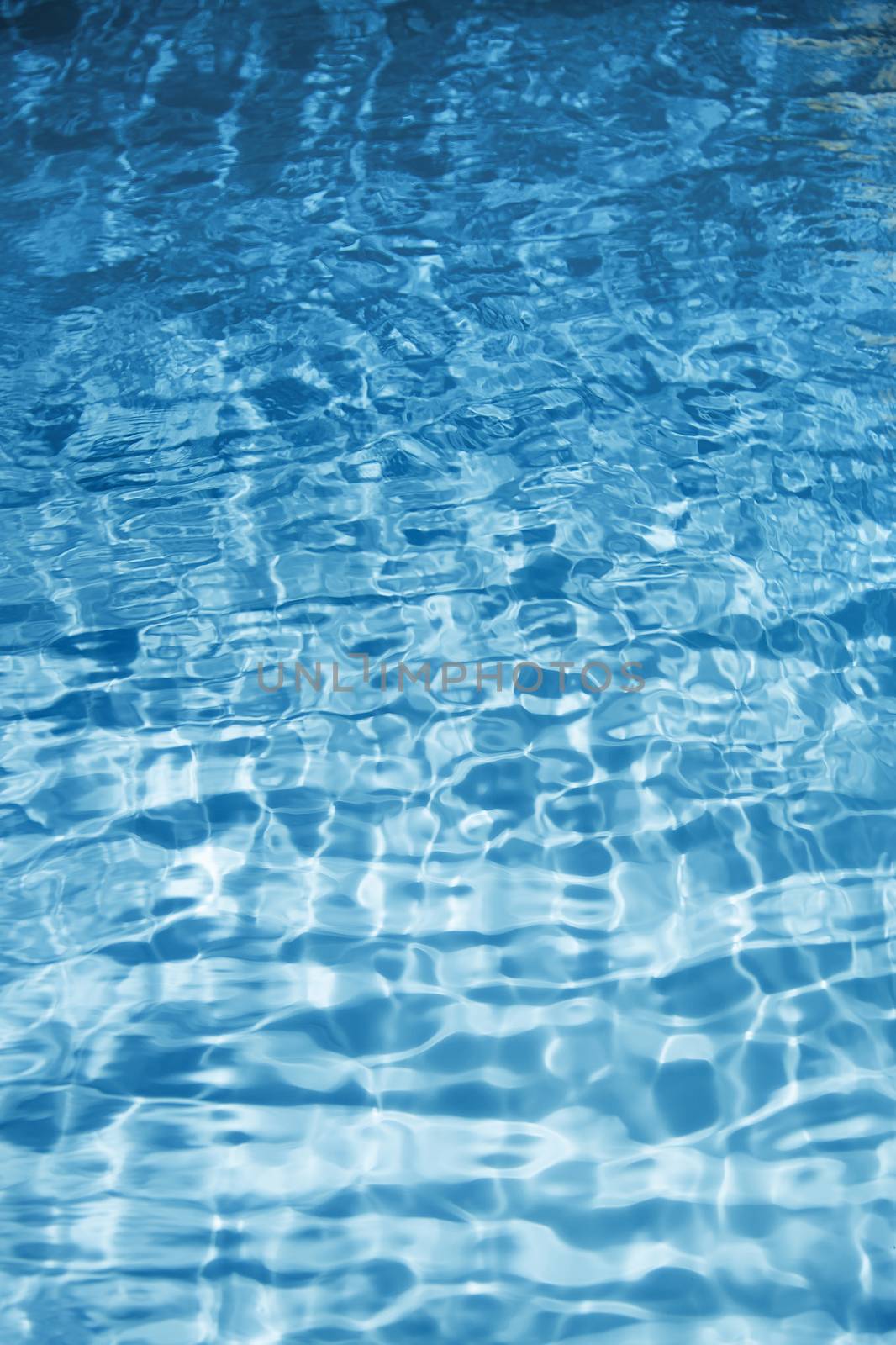 Texture of blue water. Vertical photo