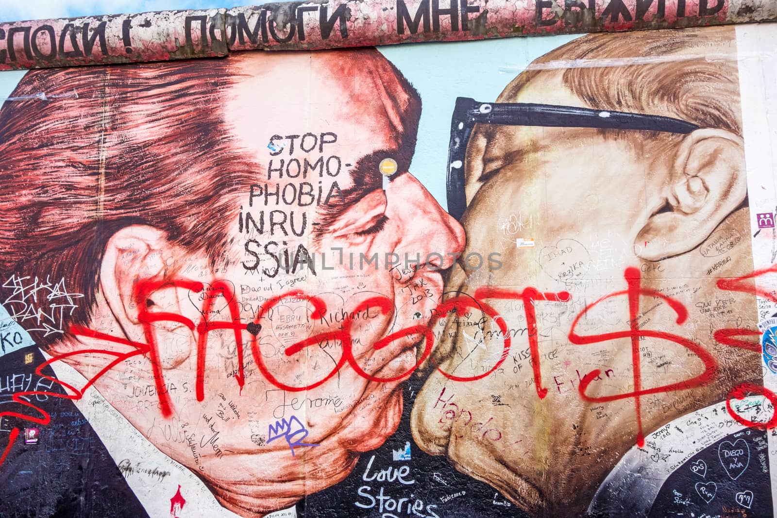 Berlin, Germany - October 26, 2013: East Side Gallery - an international memorial for freedom. Former Berlin Wall - a barrier within Germany, dividing the country.