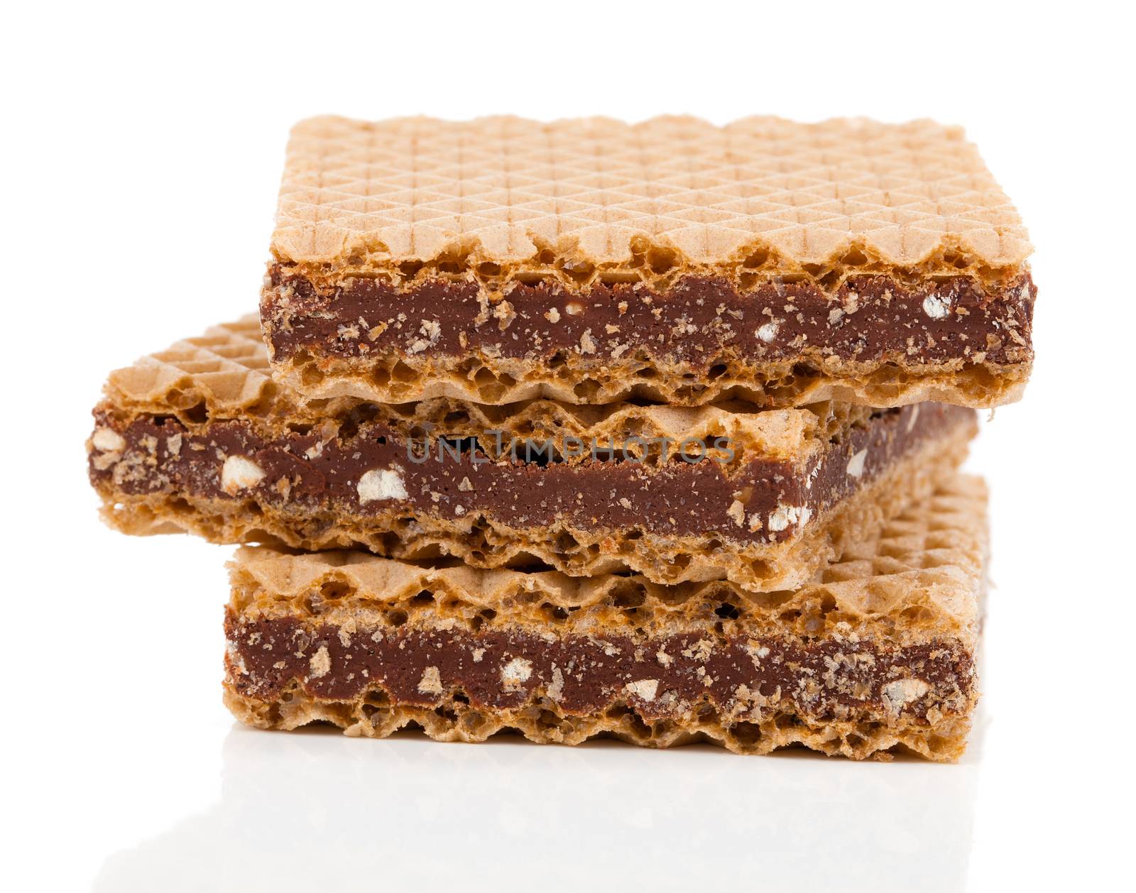 Wafers with chocolate on a white background