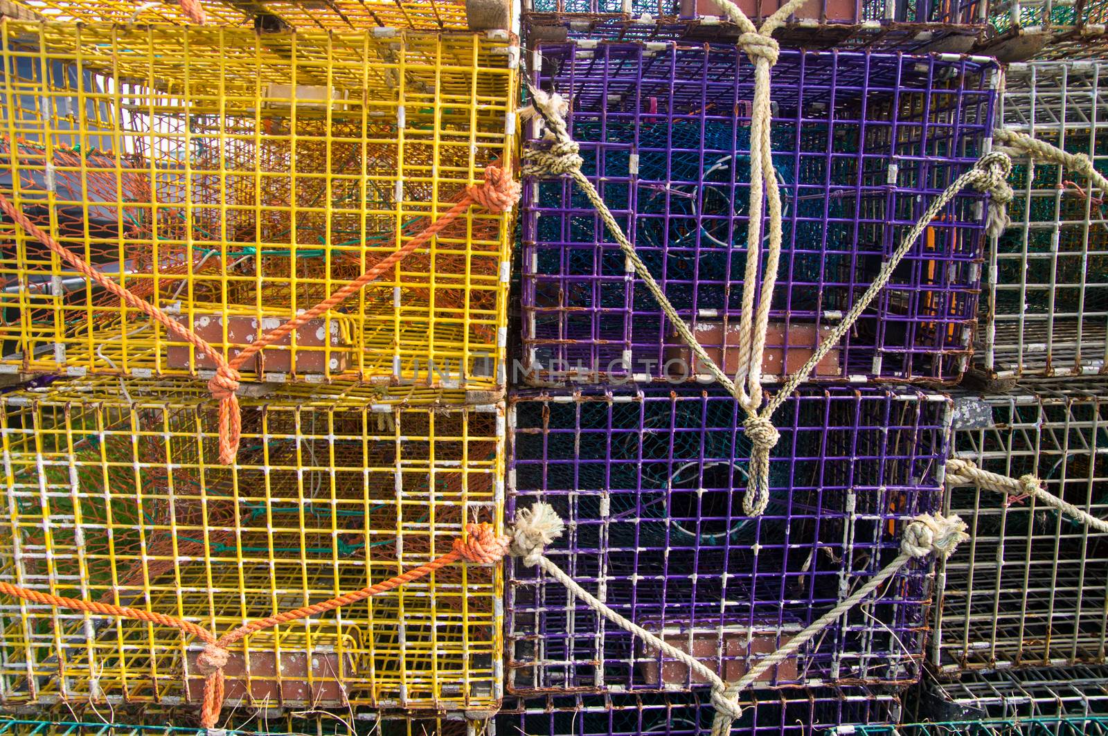 Colorful lobster pots on shore at Maine USA