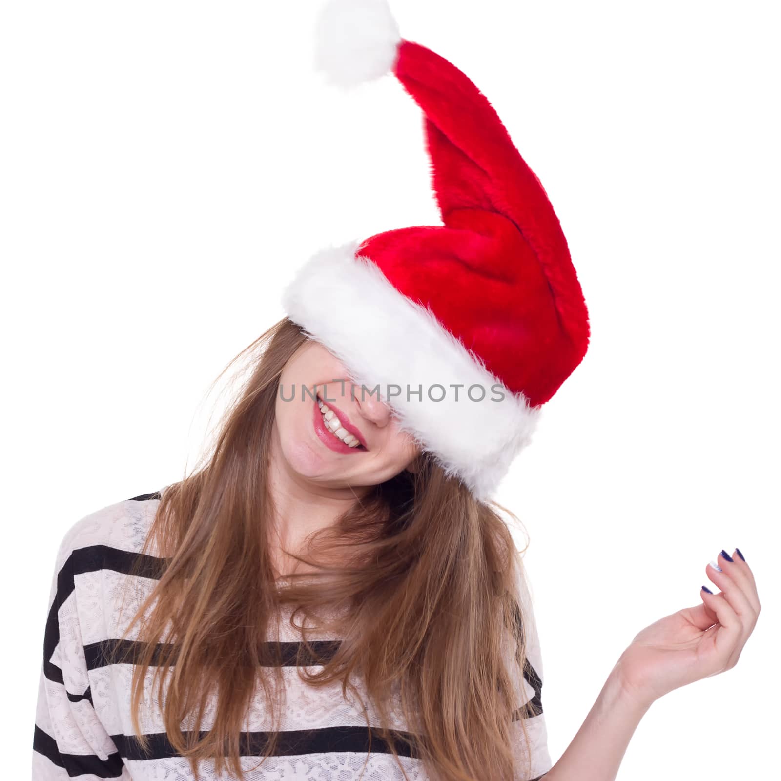 Portrait of joyful pretty woman in red santa claus hat laughing isolated on white background. Beautiful girl looking happy and excited. Happy Christmas and New Year holidays full of fun.