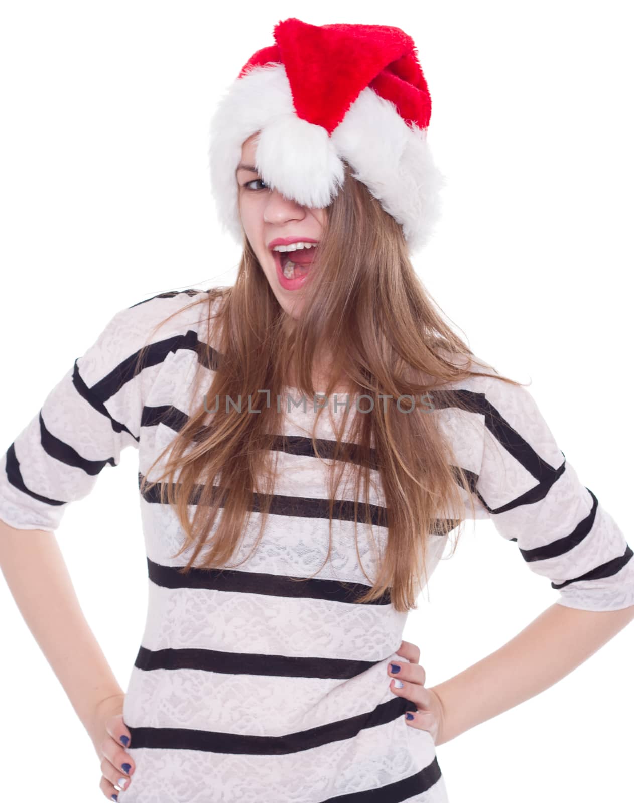 Portrait of joyful pretty woman in red santa claus hat laughing isolated on white background. Beautiful girl looking happy and excited. Happy Christmas and New Year holidays full of fun.