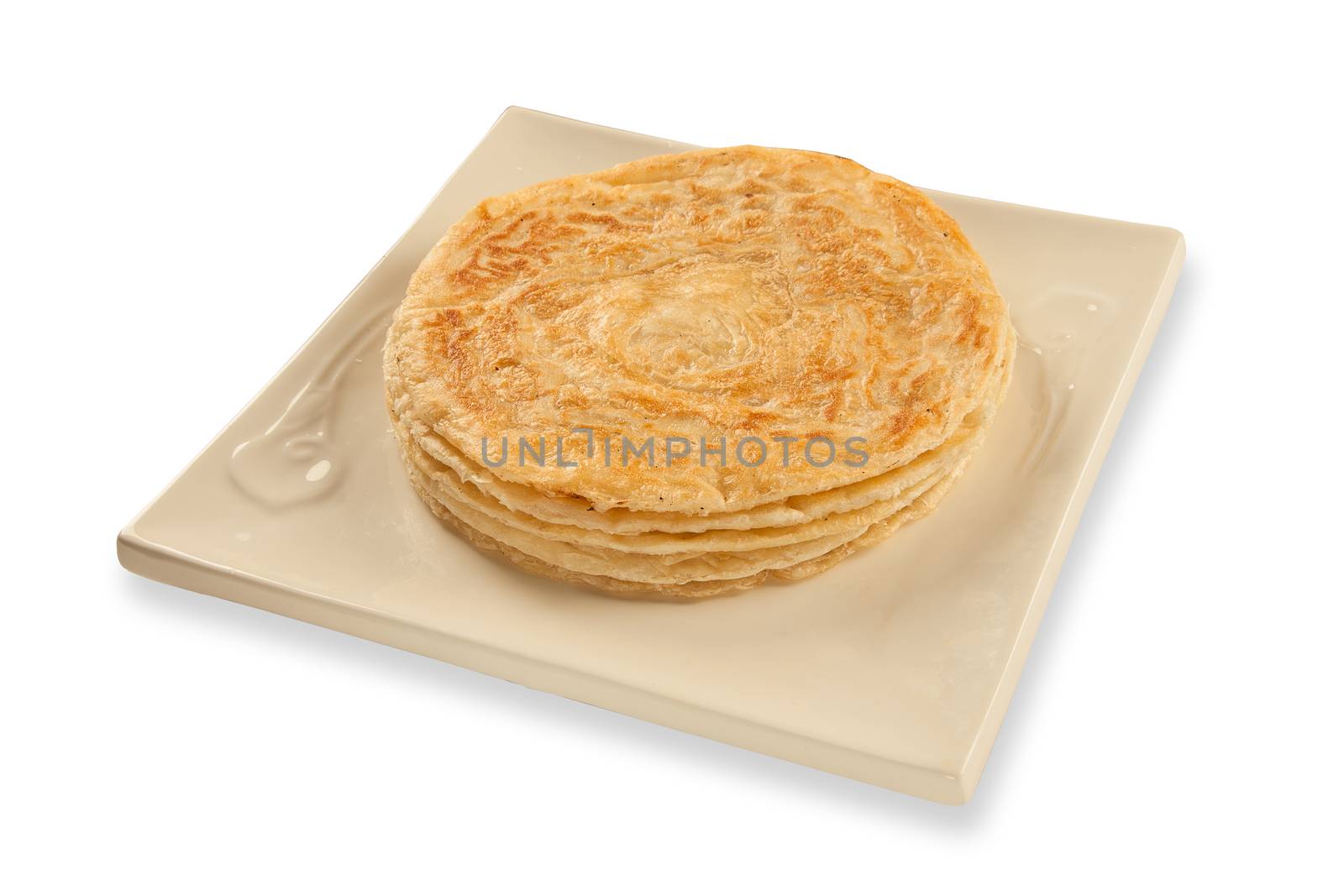 Puri paratha stack on plate isolated on a white background by haiderazim