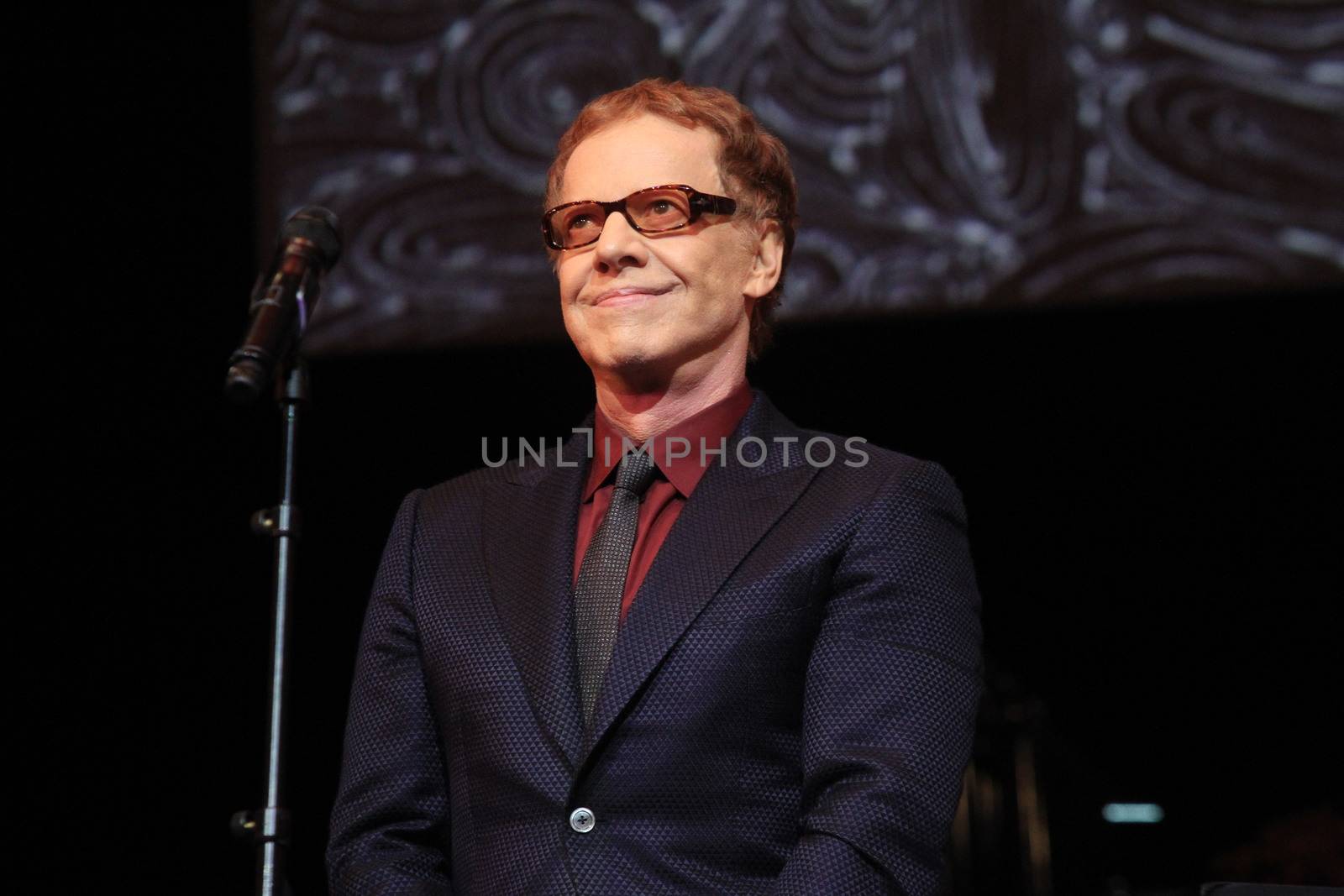 FRANCE, Paris: American composer Danny Elfman performs on the stage of the Grand Rex, in Paris, during the show Danny Elfman's music from the films of Tim Burton, on October 10, 2015.