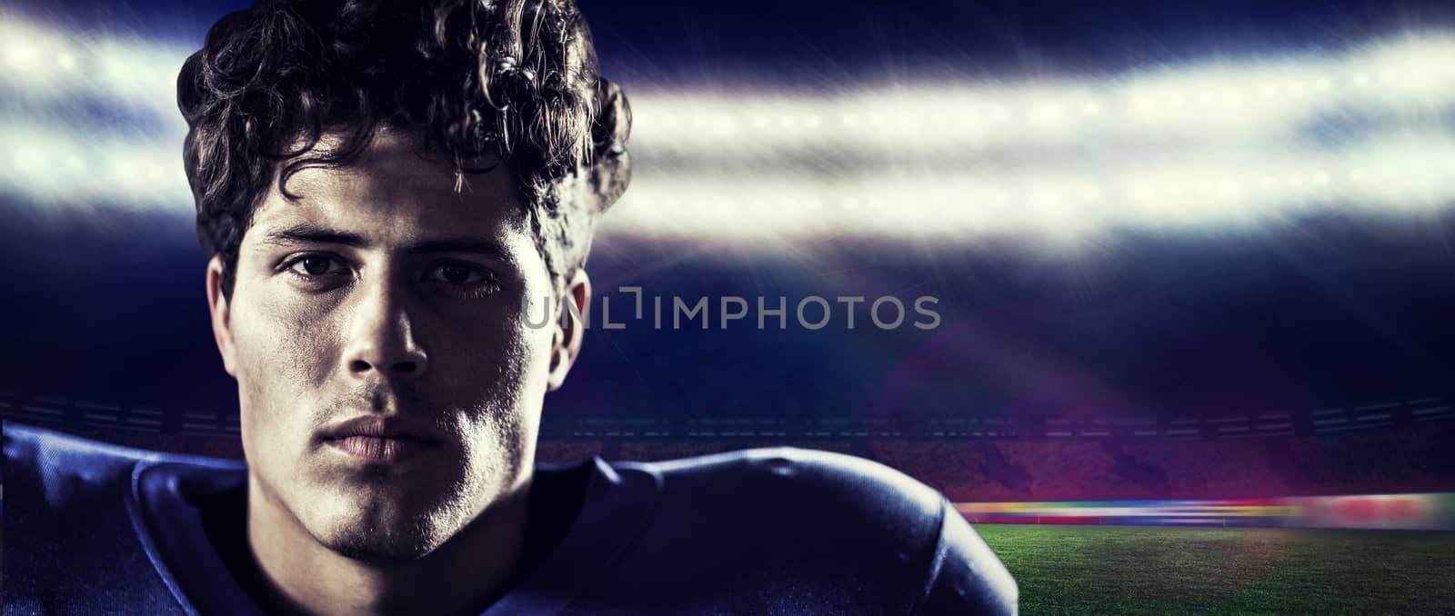 Close-up portrait of sportsman against rugby stadium