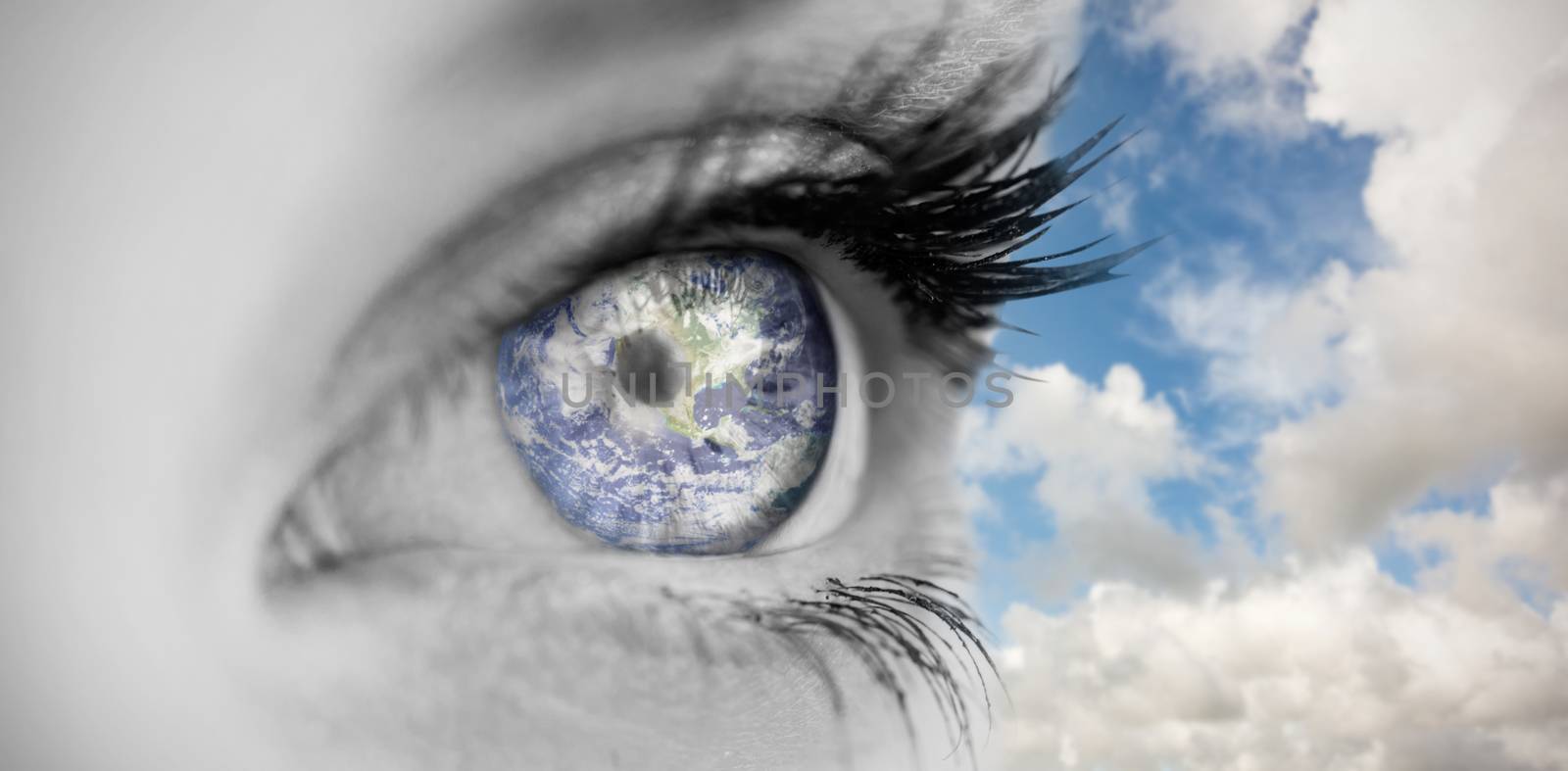 Composite image of blue eye on female face by Wavebreakmedia