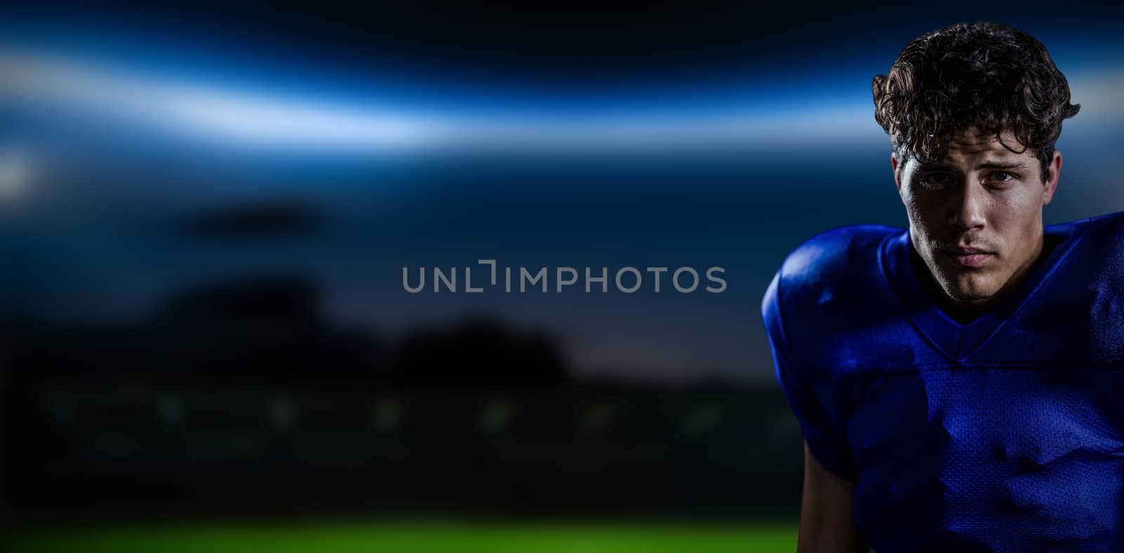Composite image of portrait of serious sportsman by Wavebreakmedia