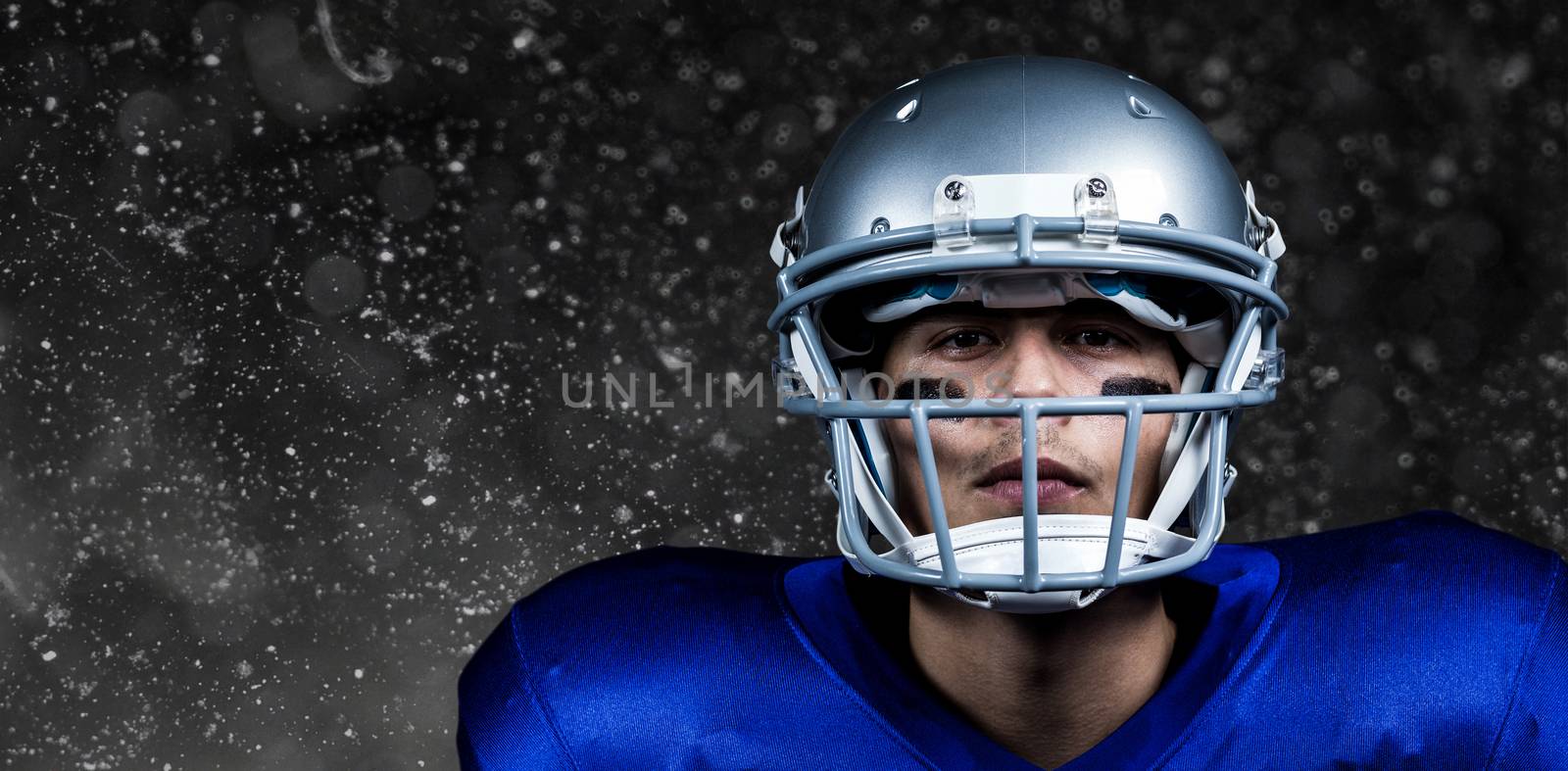 Composite image of portrait of determined american football player in uniform by Wavebreakmedia