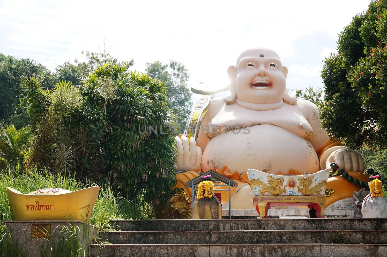 Hat Yai, Thailand -  13 Sept, 15 : Fat Laughing Buddha was blessing people for happiness, health, wealth. Goddess of  Compassion &amp; Mercy is located on top of a hill at Hat Yai Municipal Park. It is about 1000 steps to the hilltop where there is 360 degree panoramic view of Hat Yai City and Songkhla.