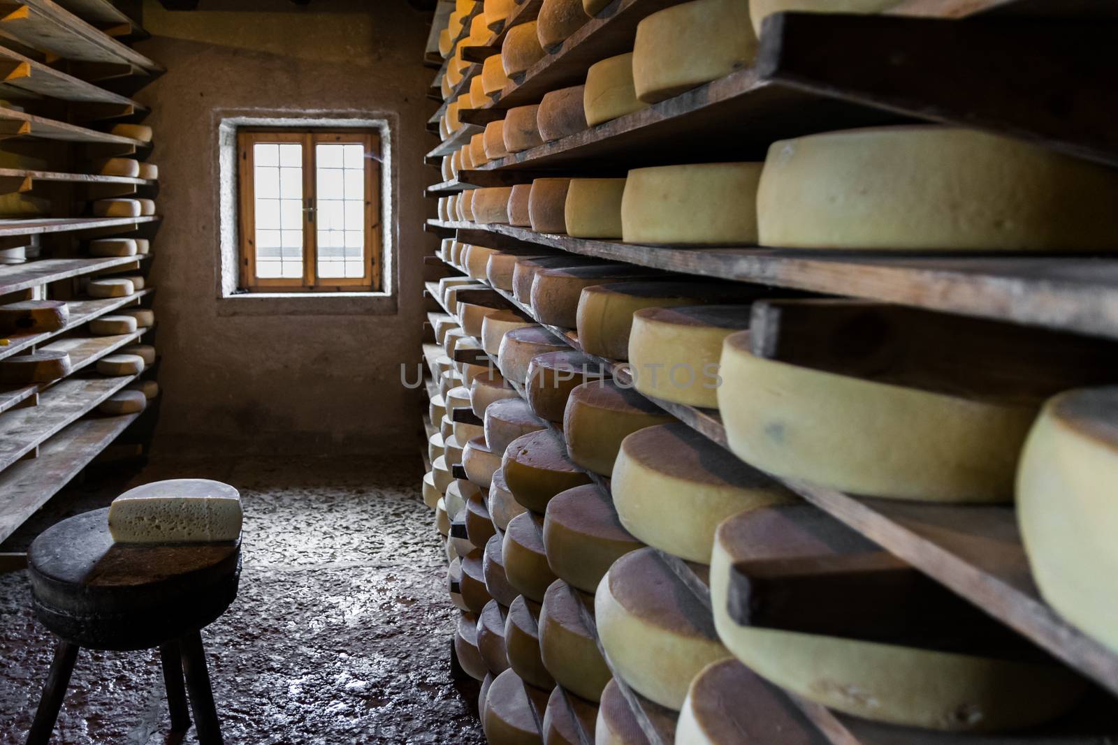 Alpine hut that produces  homemade cheeses. by Isaac74