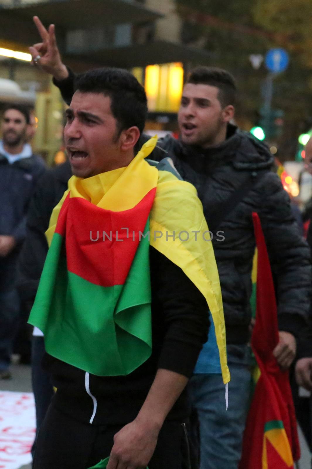 ITALY, Turin: A man screams as thousands rally at the Piazza Carlo Felice in Turin, Italy on October 13, 2015 to show solidarity with the people of Turkey, after the weekend's bombings in Ankara that left at least 97 dead. Demonstrators protest against the Turkish government, blaming the administration for the attack. Some Kurdish and leftist activists have asserted that these bombings were perpetrated in part by Turkey's governing AKP administration, intended as a blow to the pro-Kurdish HDP opposition ahead of the snap parliamentary elections in November. 