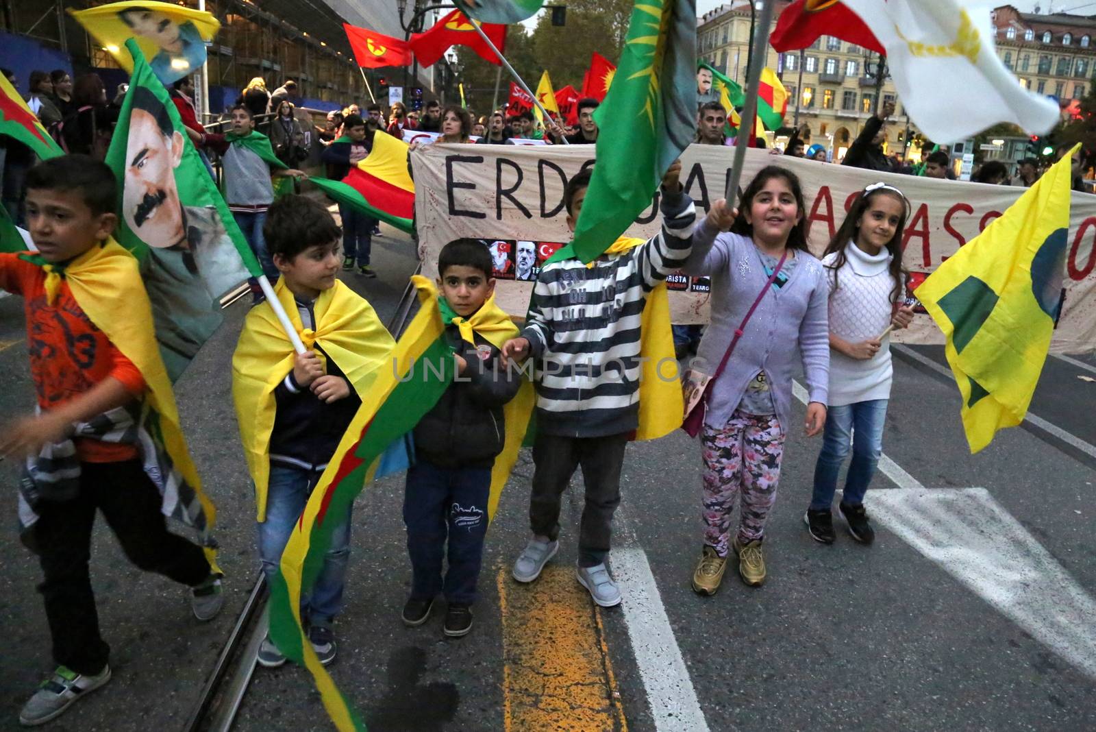 ITALY, Turin: Children join as thousands march through Turin, Italy on October 13, 2015 to show solidarity with the people of Turkey, after the weekend's bombings in Ankara that left at least 97 dead. Demonstrators protest against the Turkish government, blaming the administration for the attack. Some Kurdish and leftist activists have asserted that these bombings were perpetrated in part by Turkey's governing AKP administration, intended as a blow to the pro-Kurdish HDP opposition ahead of the snap parliamentary elections in November. 