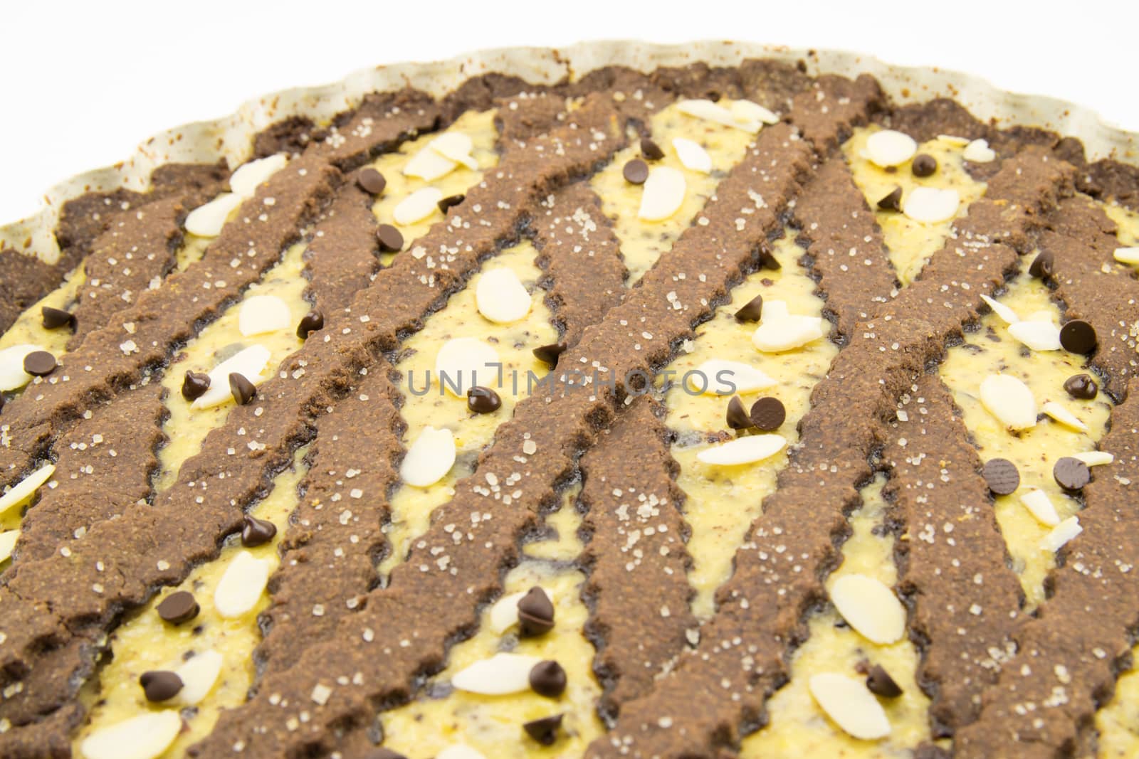 freshly baked cocoa tart with ricotta cheese and chocolate