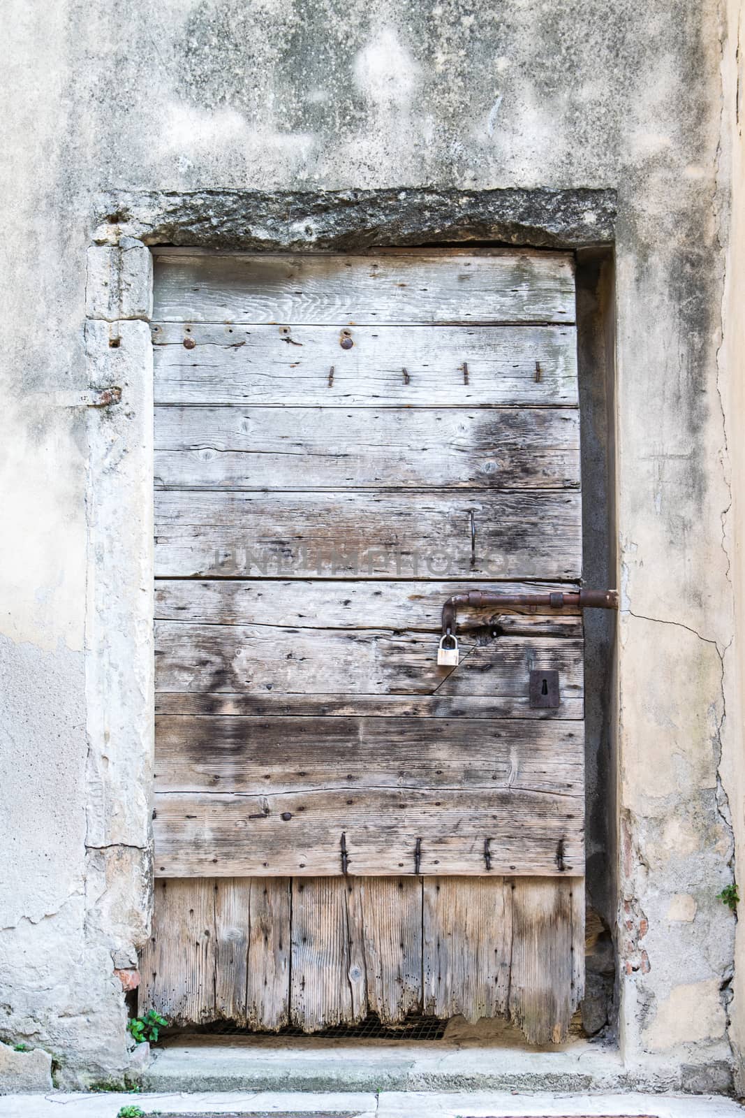 old wooden door of an empty house