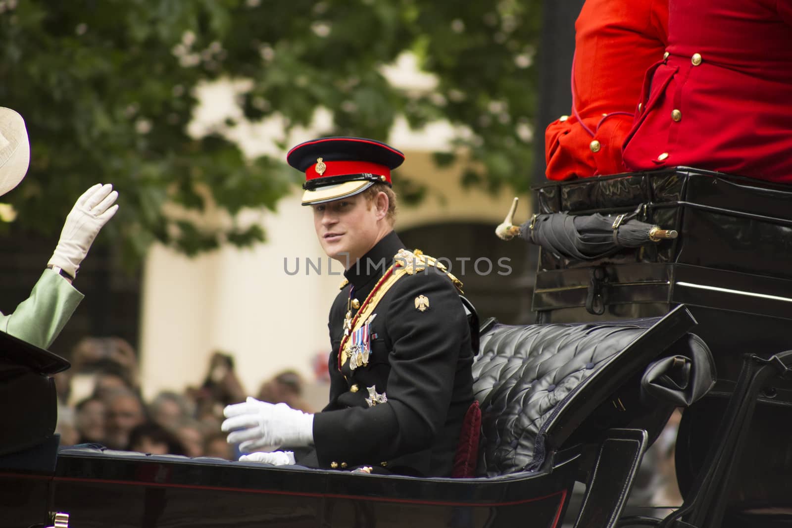 London, England - June 13, 2015:  Prince Harry in an open carriage for trooping the colour 2015 to mark the Queens official birthday, London, UK.