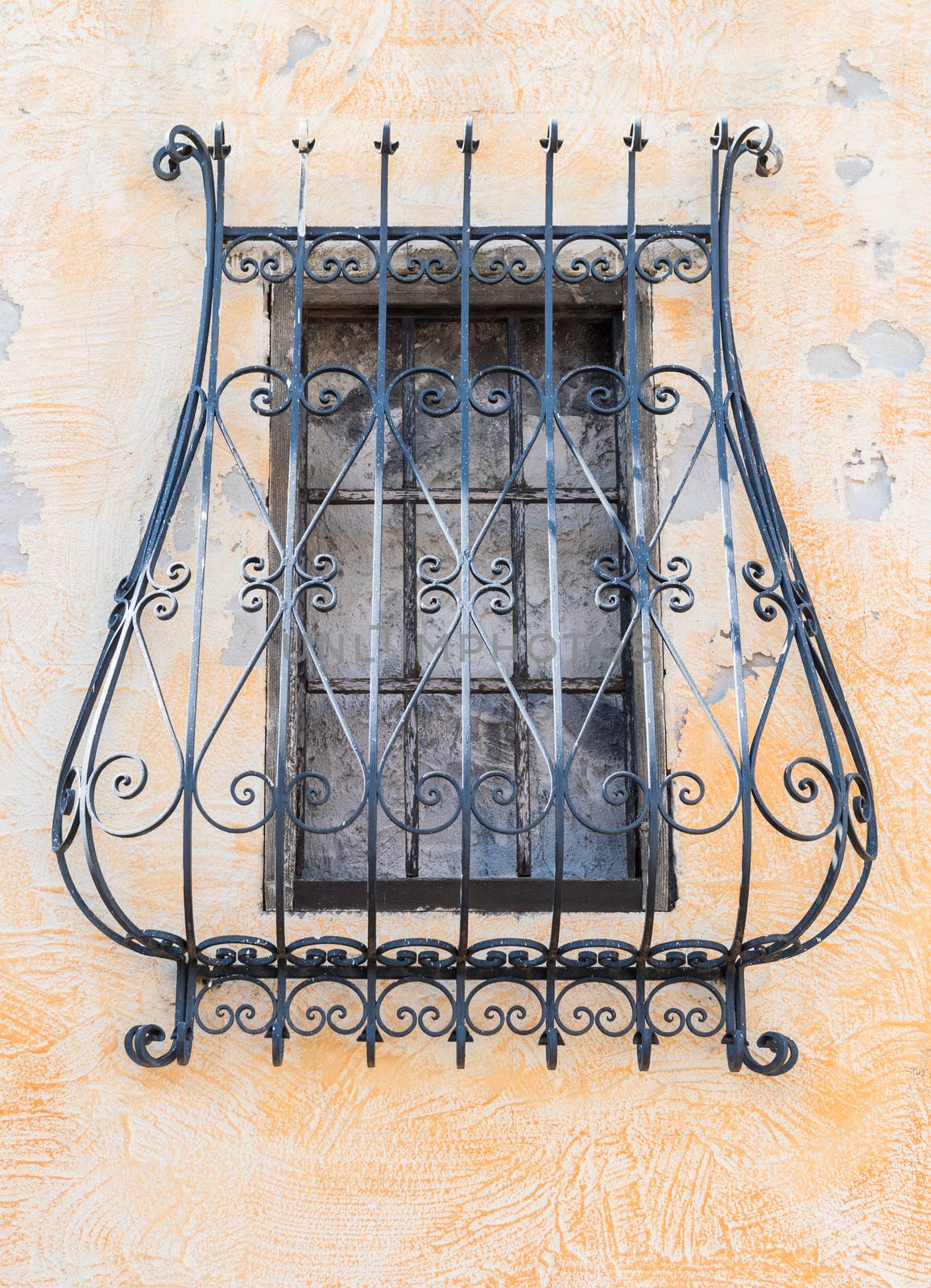 grate of a covered window of an ancient Italian monastery by Isaac74