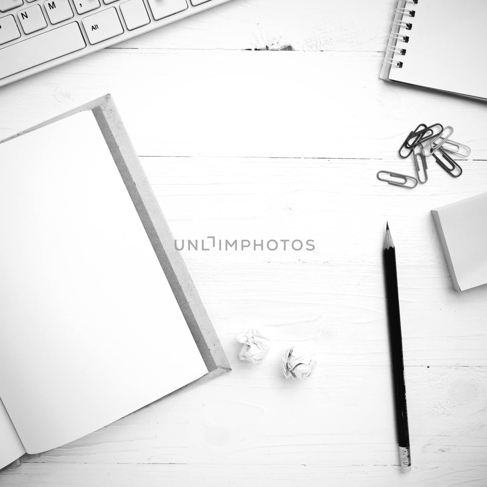 computer and notebook with office supplies black and white tone  by ammza12