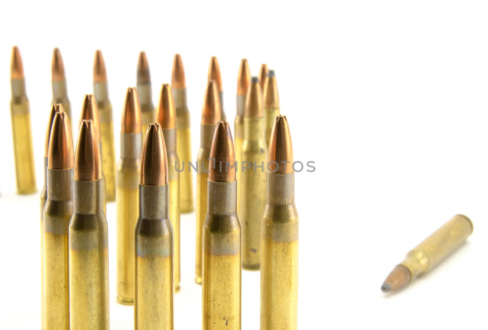 Composition with hollow-point ammunition for rifle on white background.