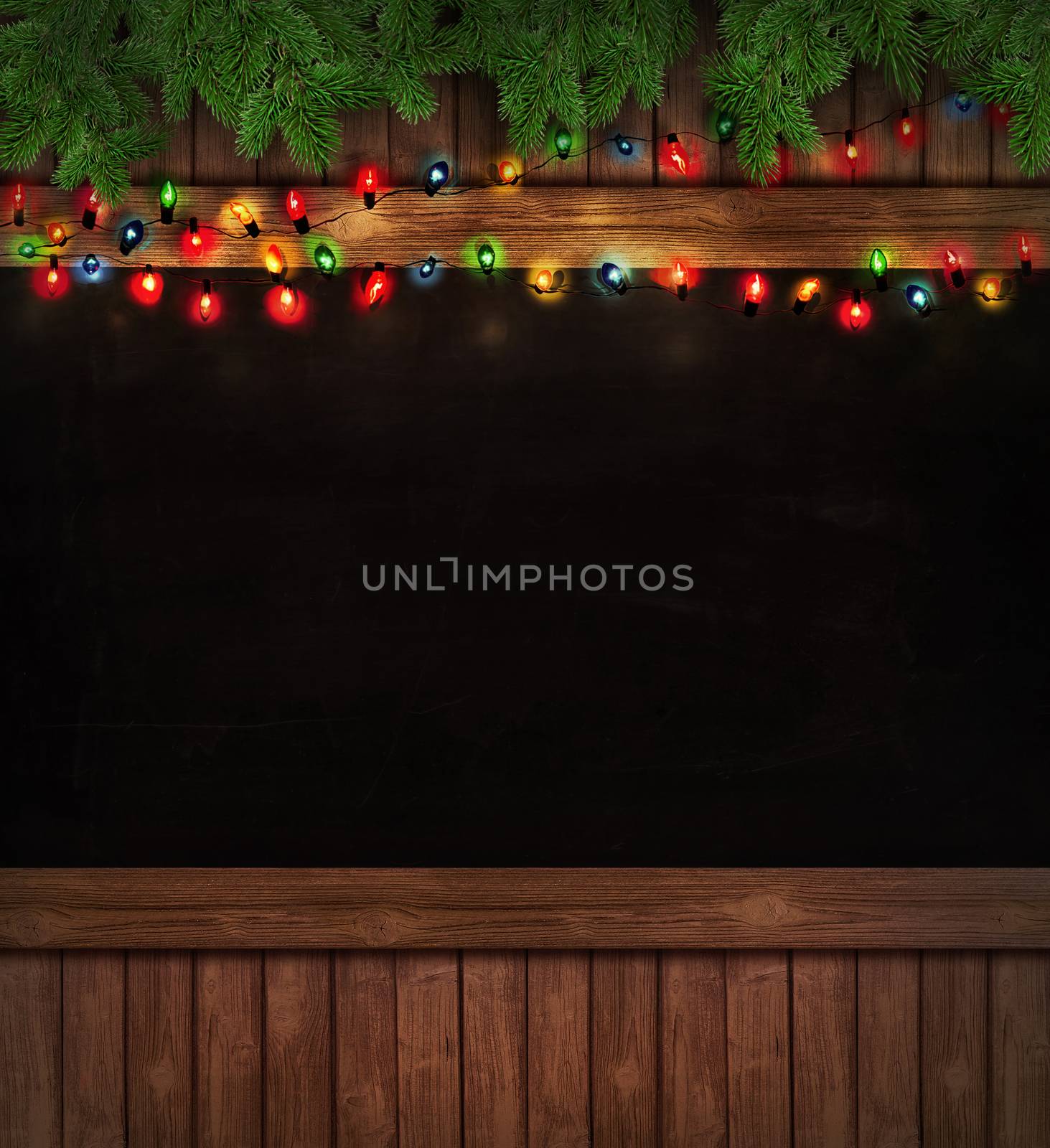 Christmas holiday lights on wooden blackboard