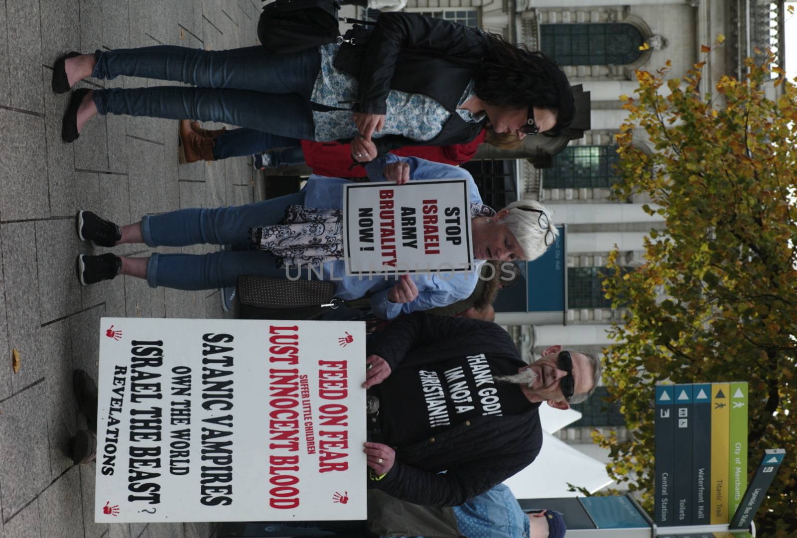 UK, Belfast: Pro-Palestinian campaigners held a demonstration at Belfast City Hall on October 10, 2015. The protesters accused the Israeli army of deliberately targeting civilians and called for a boycott of Israeli goods. 