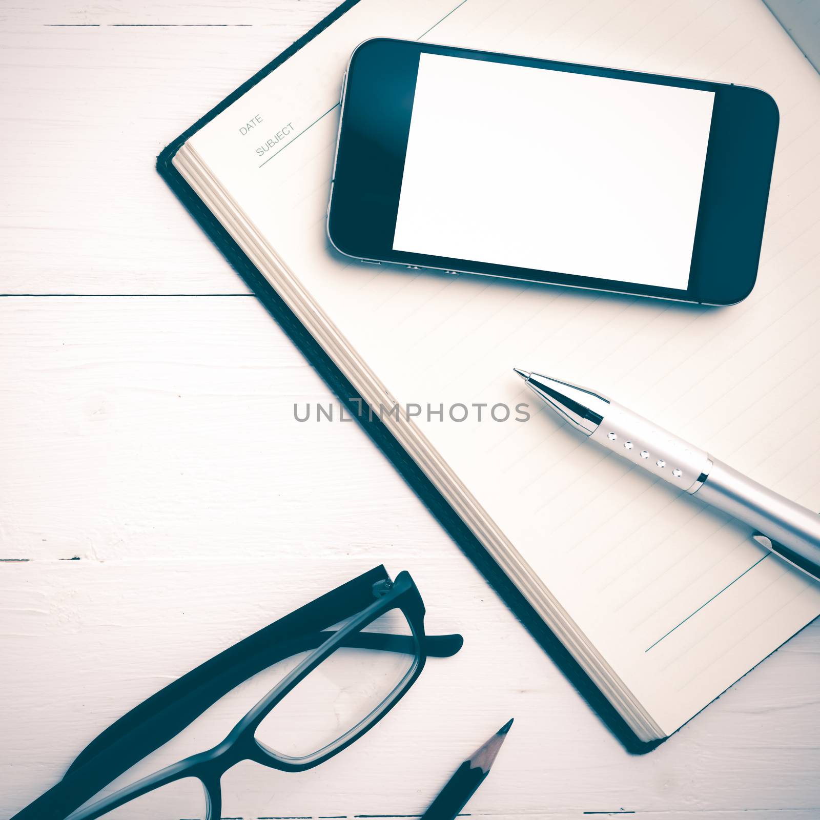 smart phone on notebook vintage style by ammza12