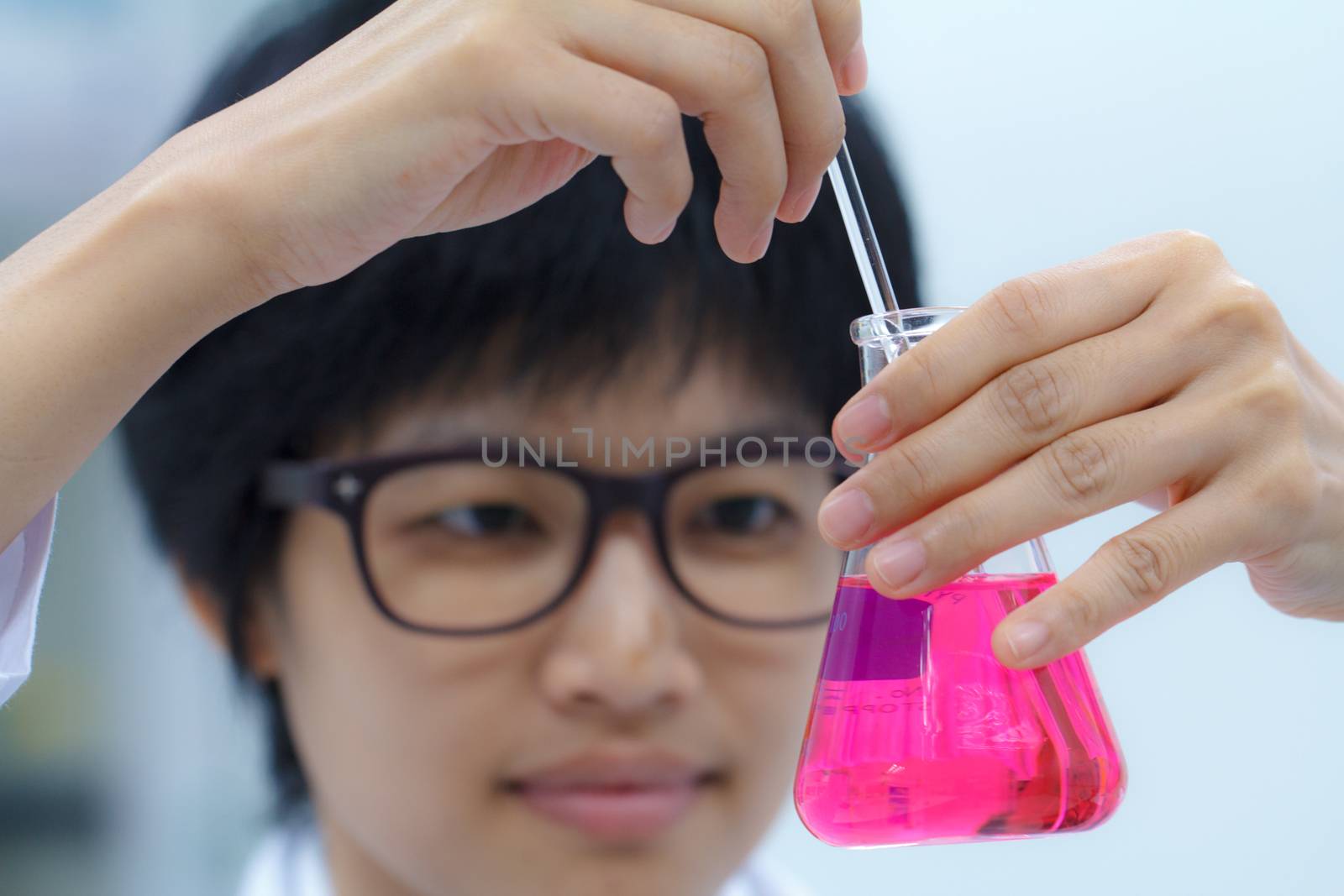 Researcher working with chemical